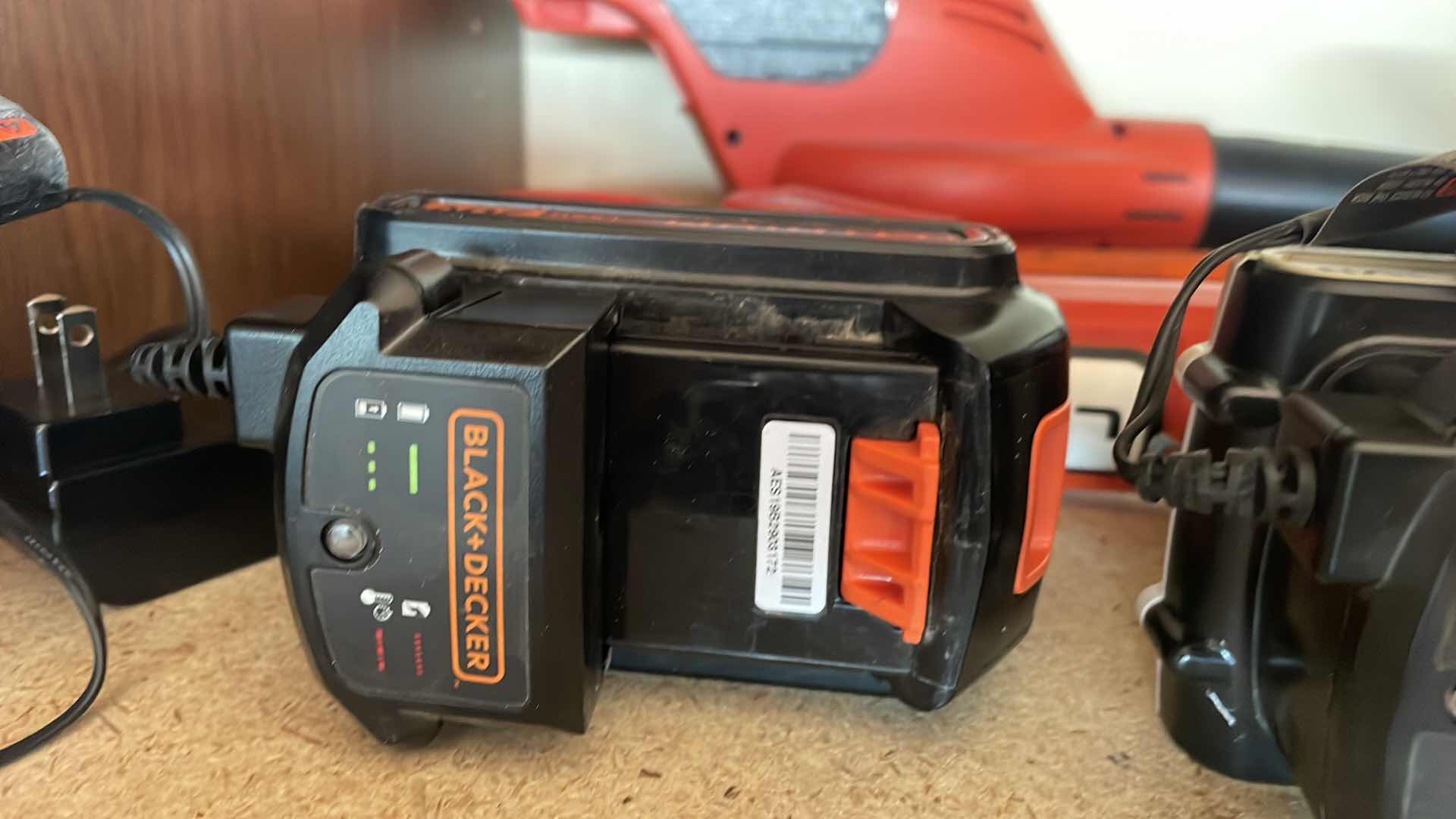 Photo 1 of BLACK & DECKER, 20 V BLOWER HEDGER AND WEEDEATER THREE BATTERIES, THREE CHARGERS