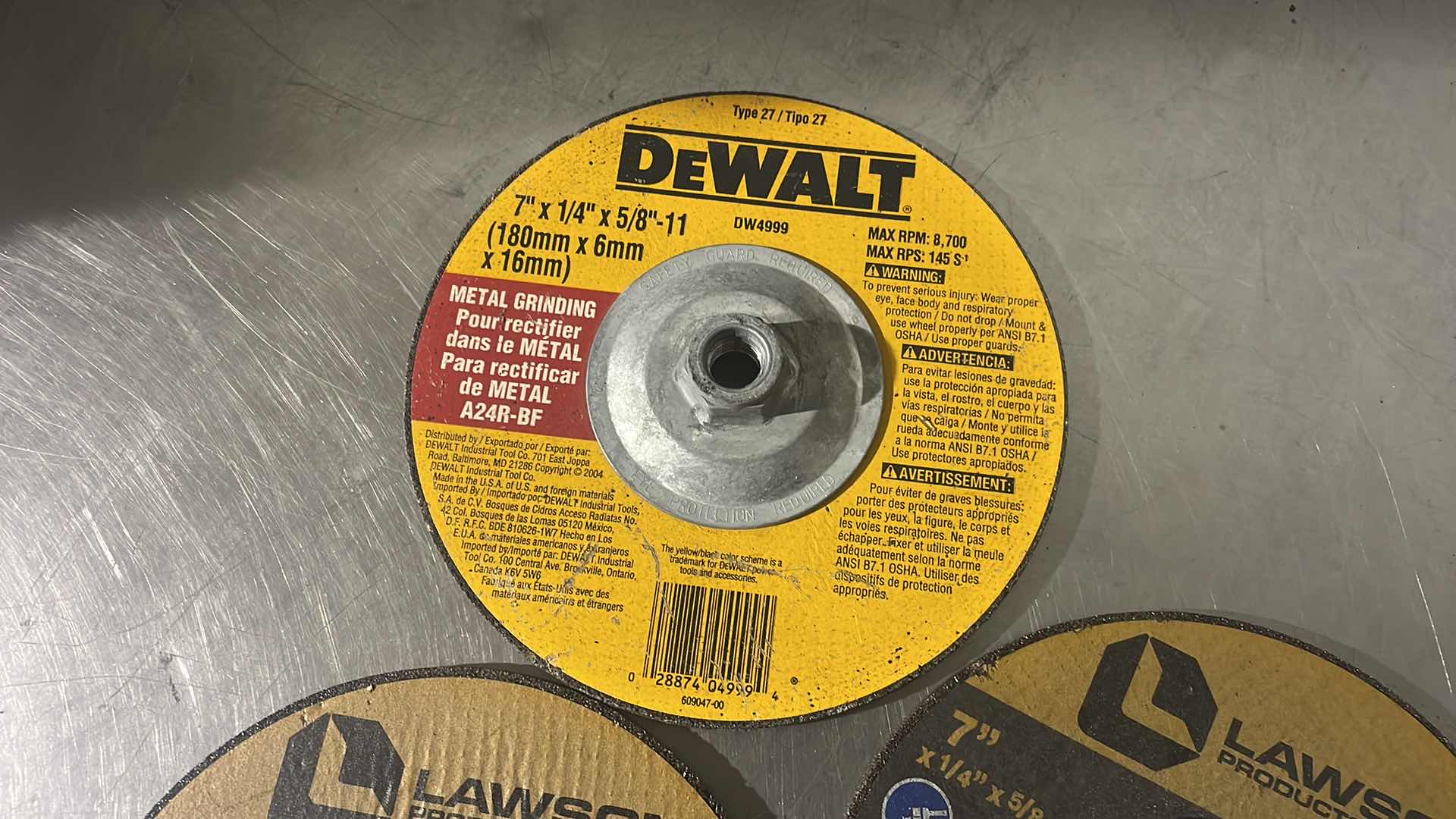 Photo 1 of GRINDING WHEELS 7” X 1/4” X 5/8”-11 (3)