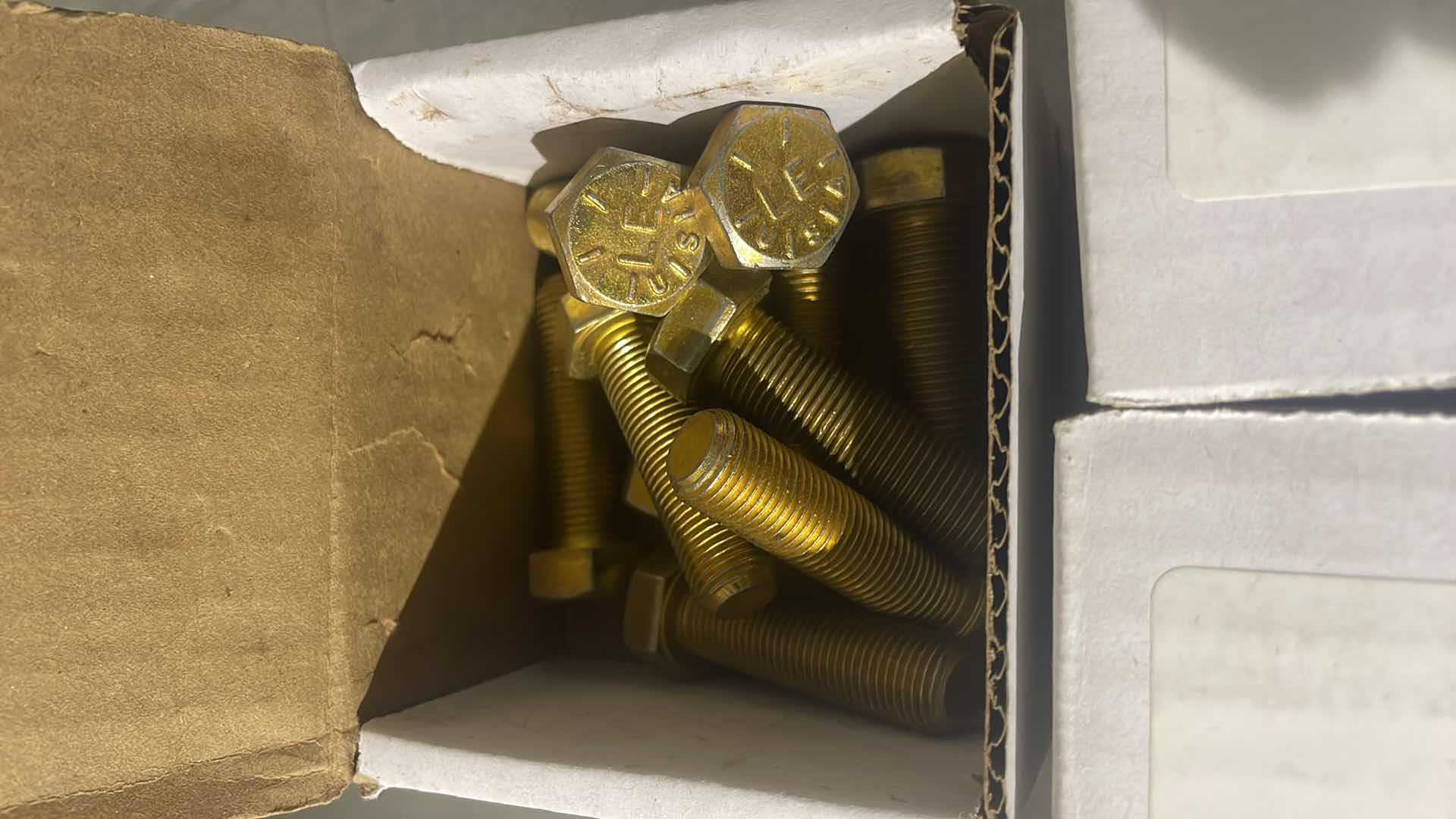 Photo 1 of NF8 1/2”-20 X 1 3/4” GRADE 8 HEX CAP SCREW YELLOW ZINC PLATED (50)