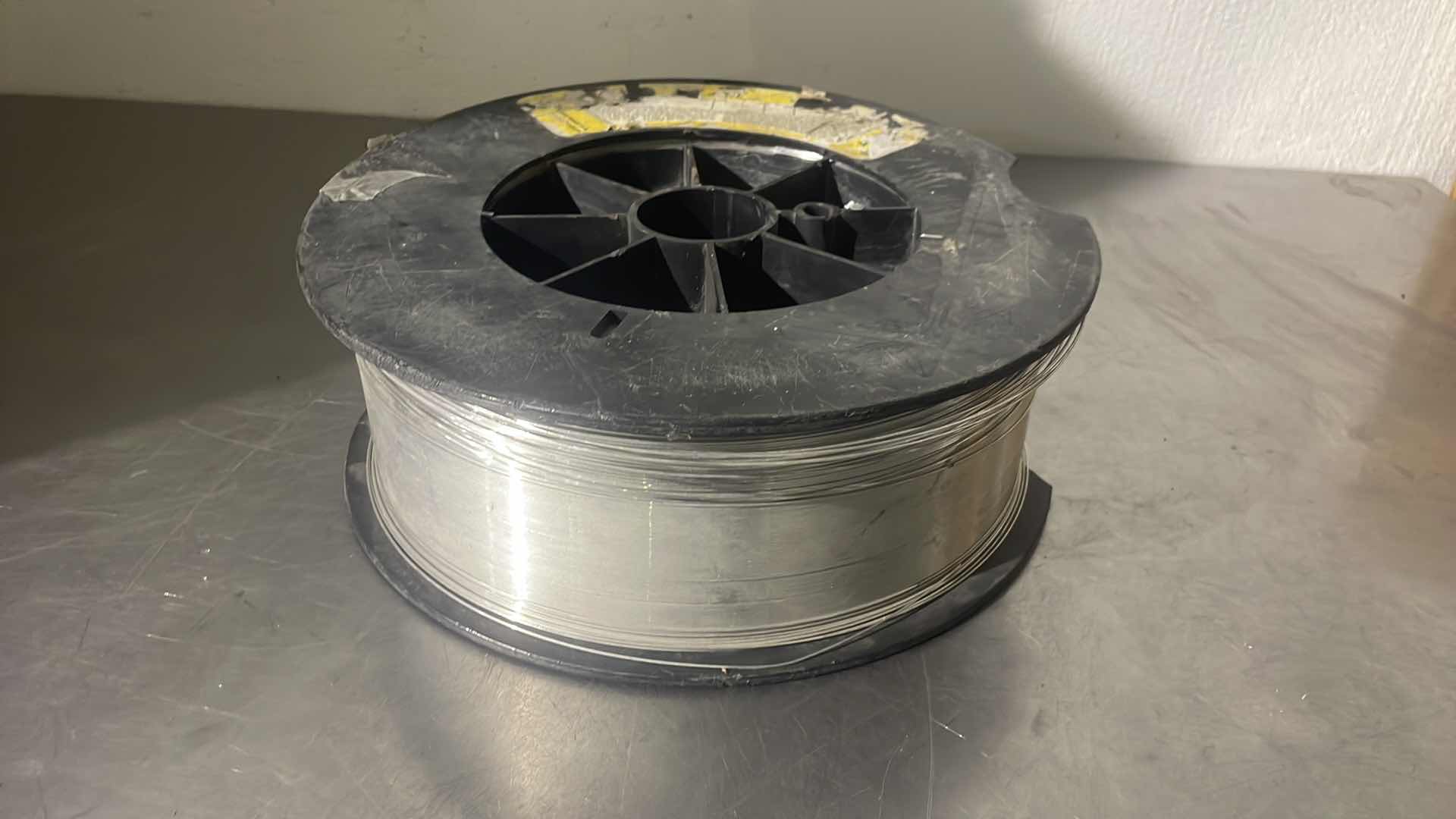 Photo 1 of ESAB WELDING WIRE UNKNOWN SIZE AND TYPE WEIGHS 17.7LBS. POSSIBLY ALUMINUM