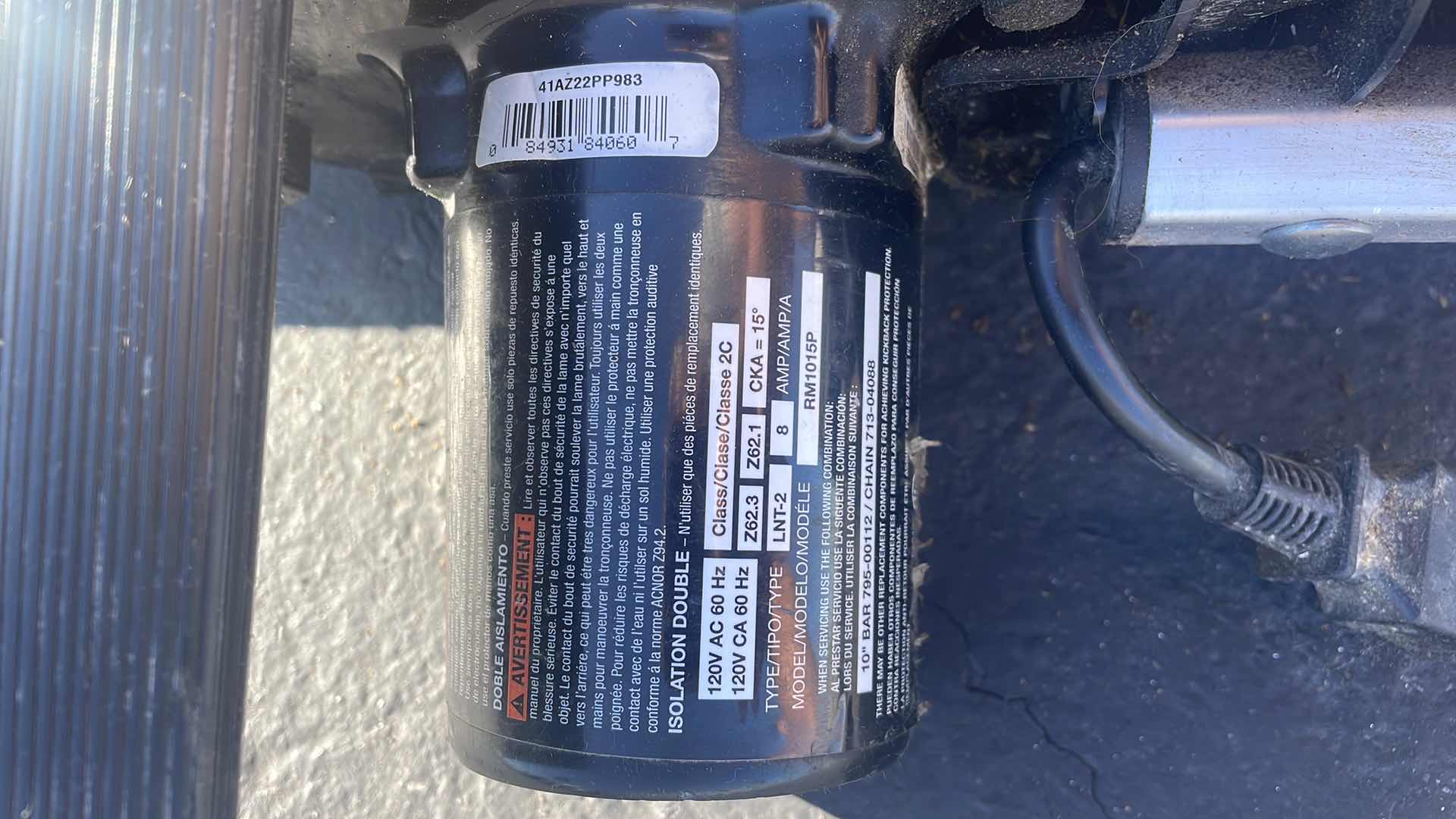 Photo 1 of REMINGTON ELECTRIC POLE SAW - 10" BAR, 8 AMP MOTOR, MODEL# RM1015P BRANCH WIZARD