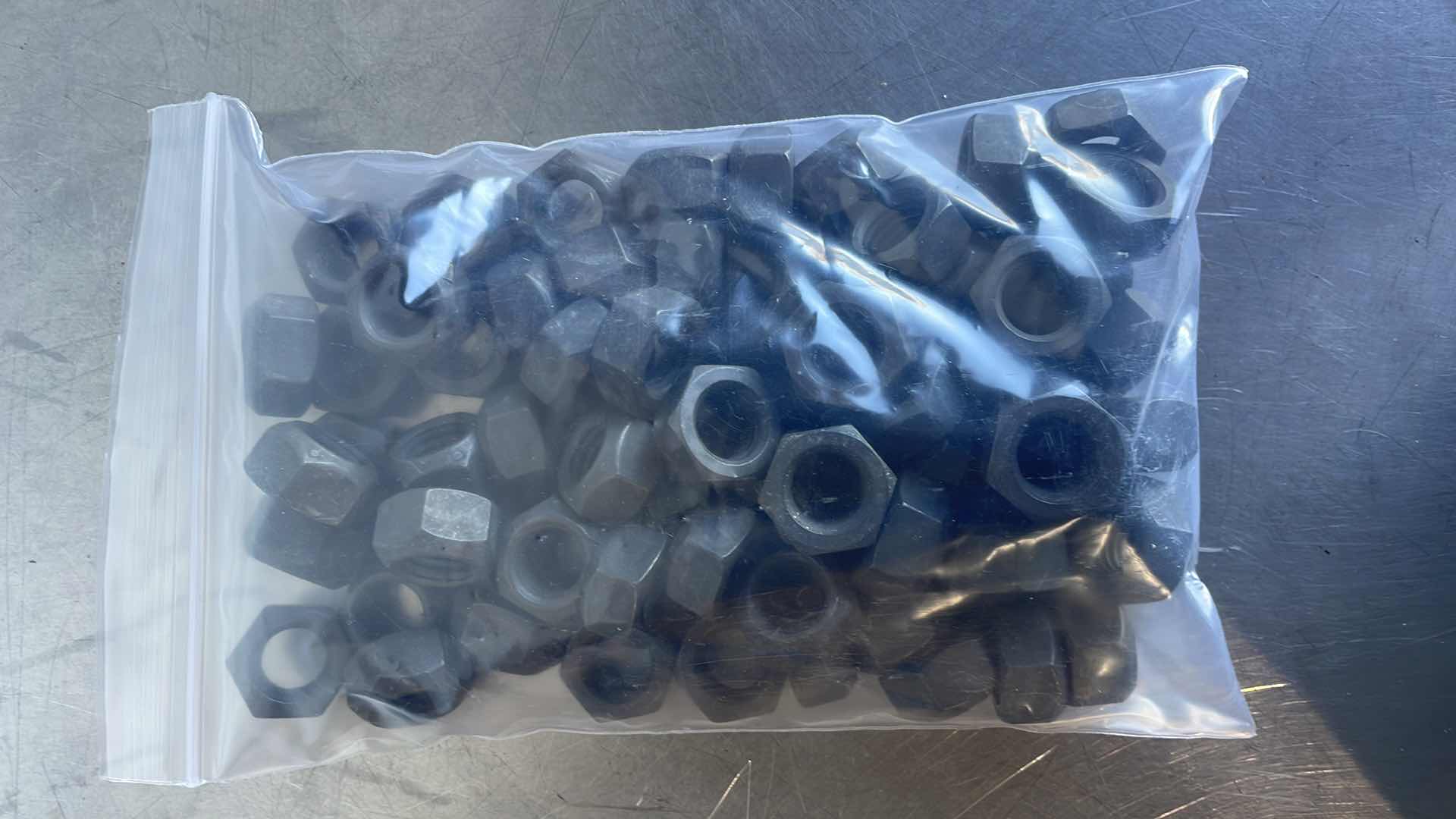 Photo 2 of 5/8”-11 GRADE 8 LOCKNUTS 70PCS