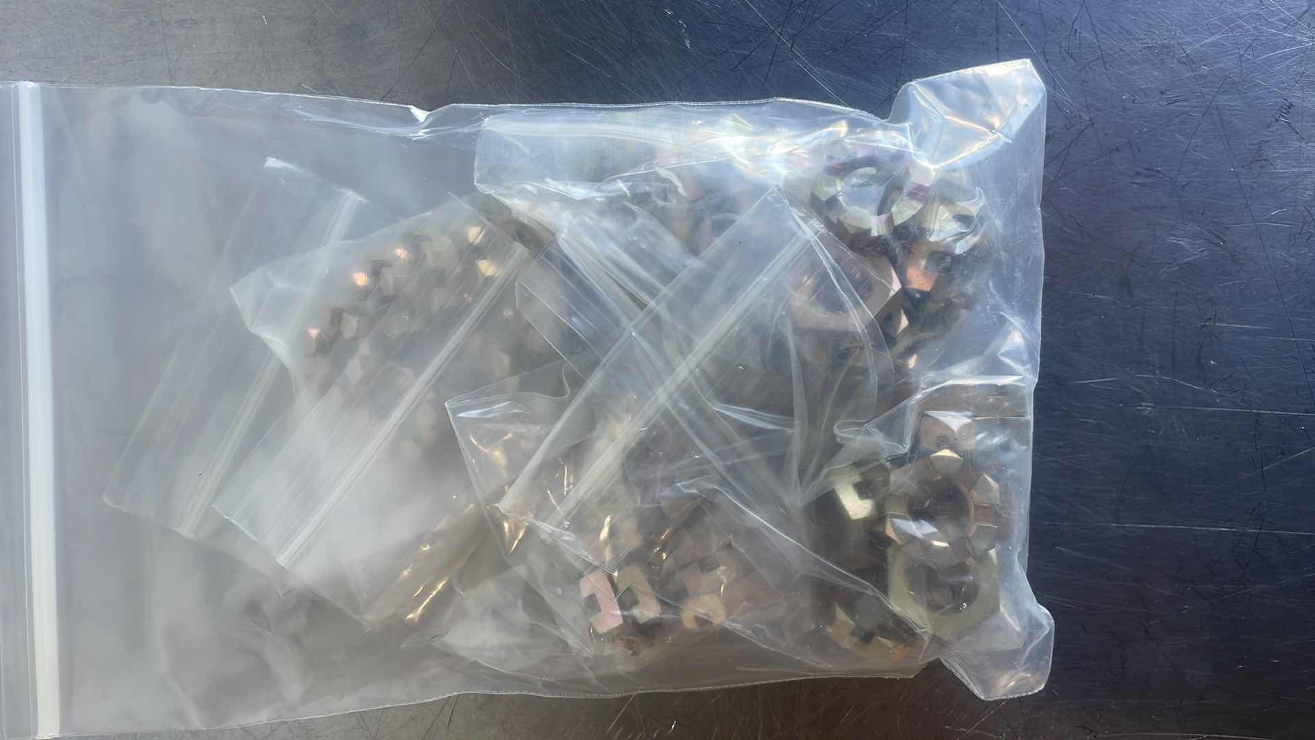 Photo 2 of 1/2-20 SLOTTED (CASTELLATED) HEX HEAD JAM NUTS (100 Pcs) 1/4" NUT 
HEIGHT