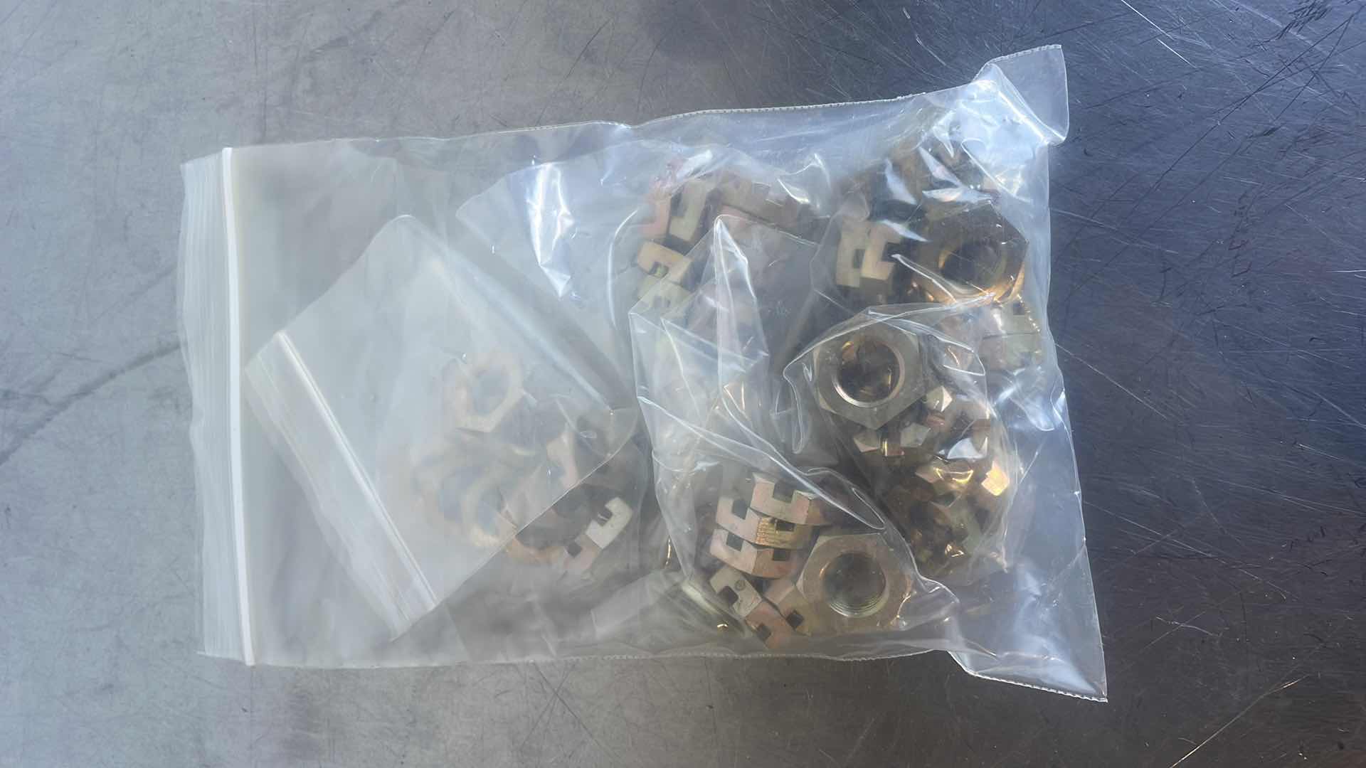 Photo 1 of 1/2-20 SLOTTED (CASTELLATED) HEX HEAD JAM NUTS (100 Pcs) 1/4" NUT 
HEIGHT