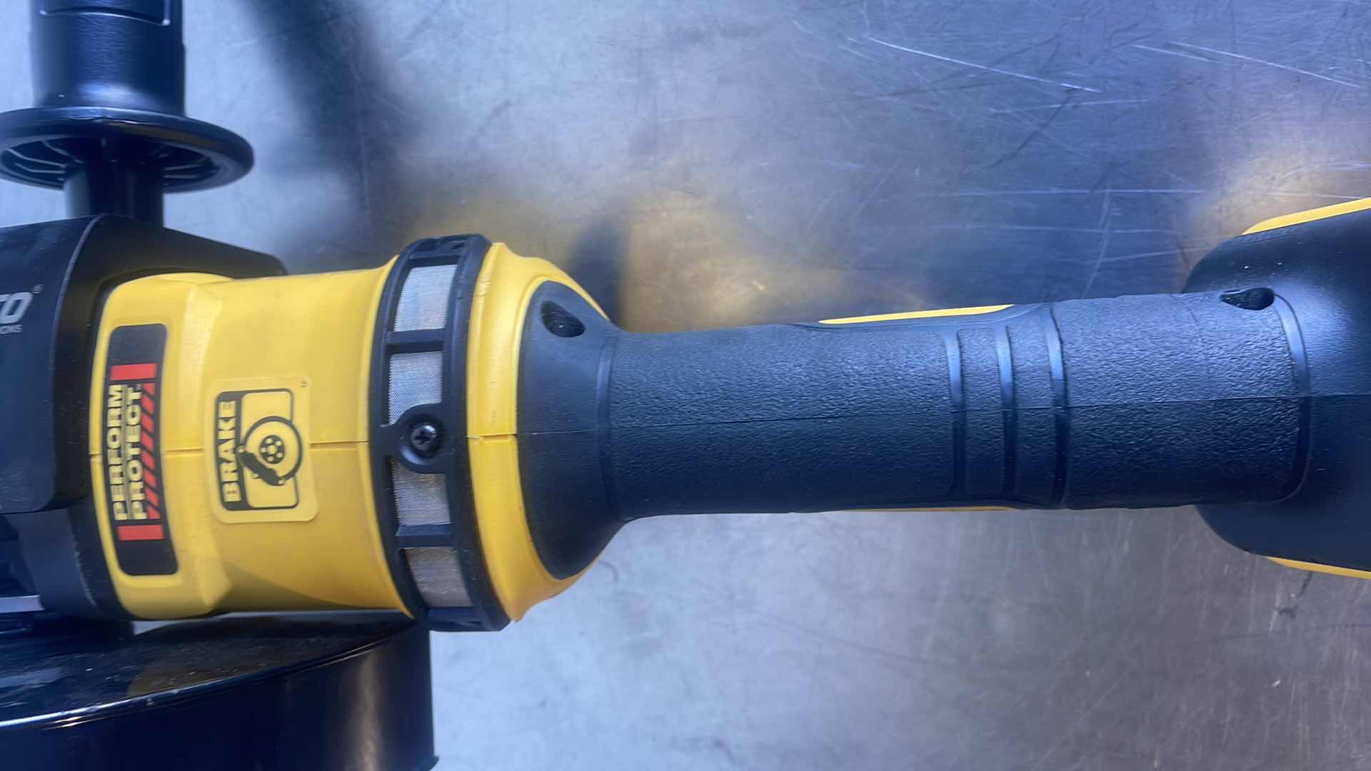 Photo 1 of DEWALT FLEXVOLT 60V MAX DCG414 GRINDER WITH BROCO 7” DIAMOND BLADE