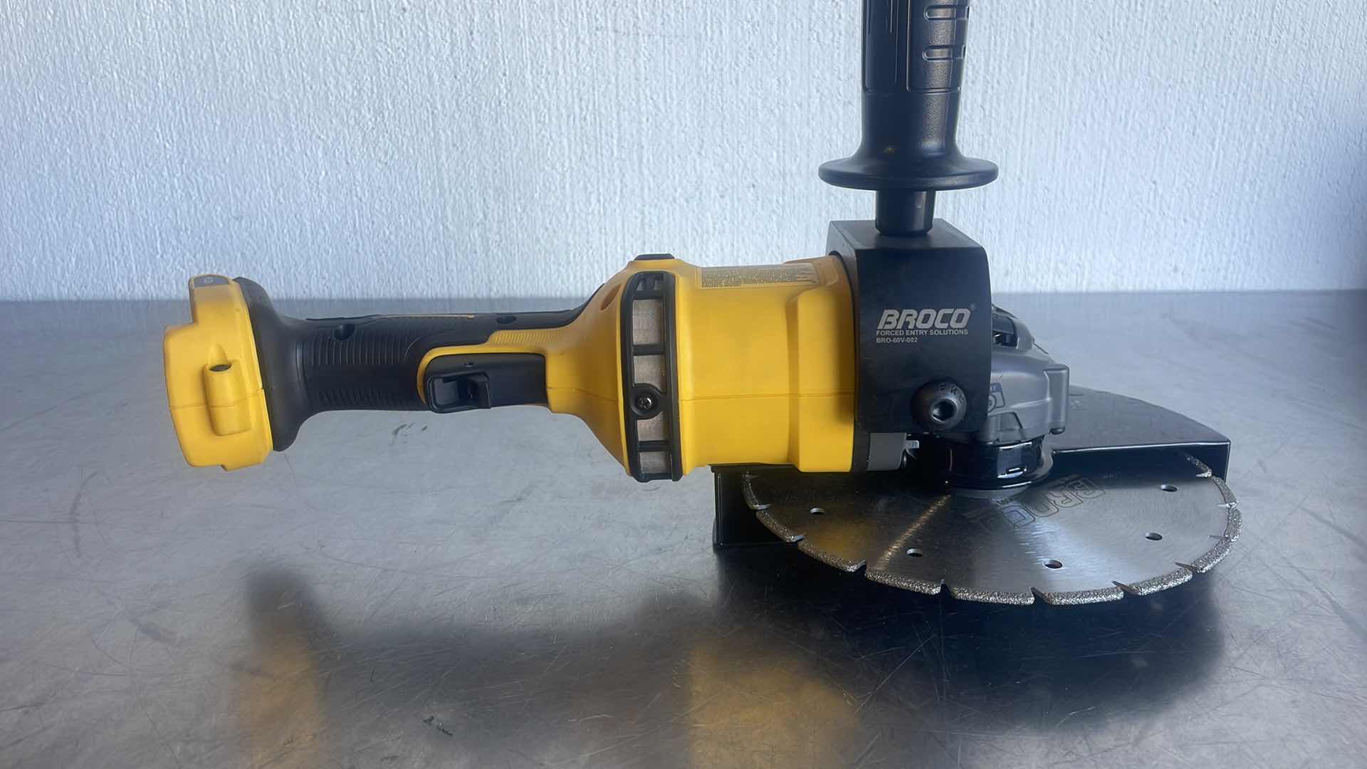 Photo 1 of DEWALT FLEXVOLT 60V MAX DCG414 GRINDER WITH BROCO 7” DIAMOND BLADE