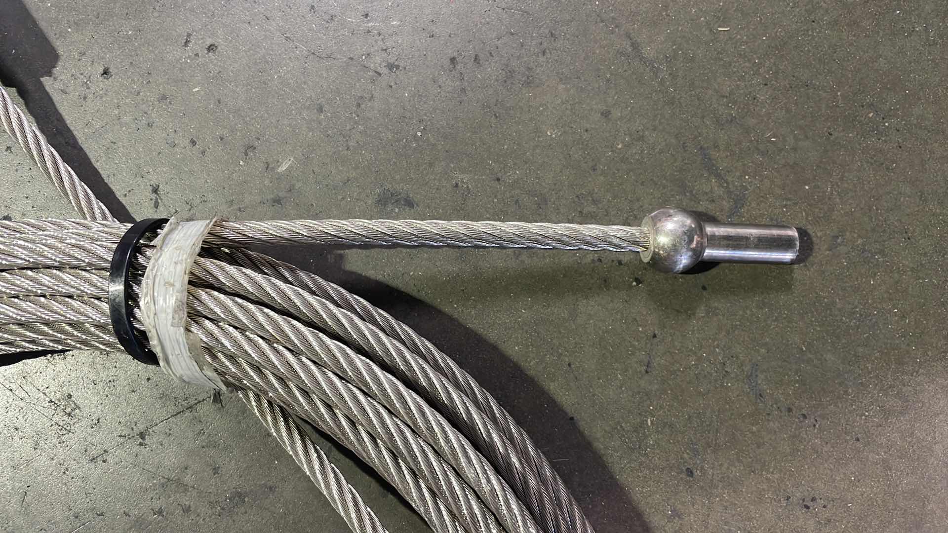 Photo 1 of 5/16” WIRE ROPE WITH HOOK UNKNOWN LENGTH