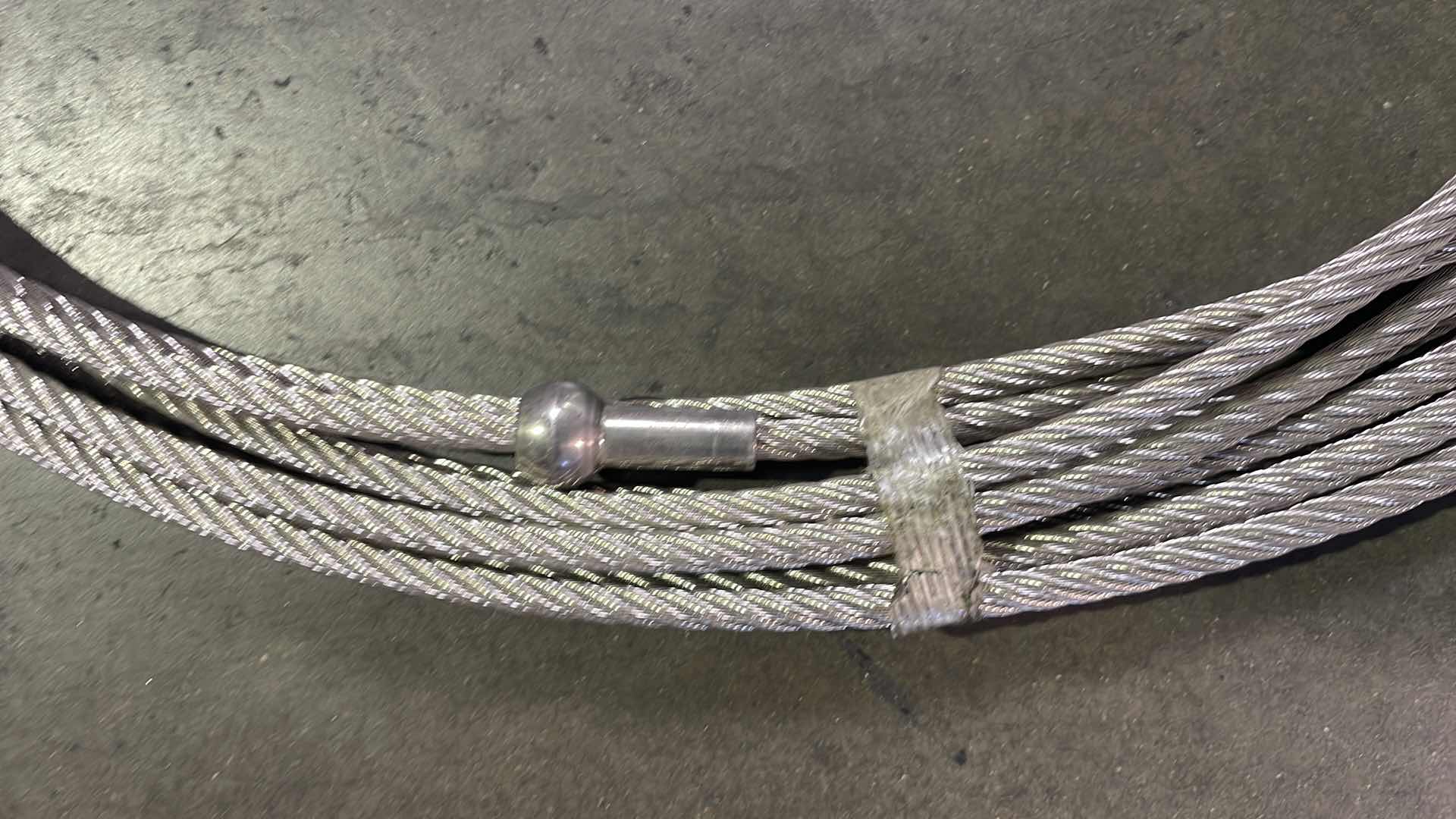 Photo 1 of 5/16” WIRE ROPE WITH HOOK RATED TO 5000LBS UNKNOWN LENGTH