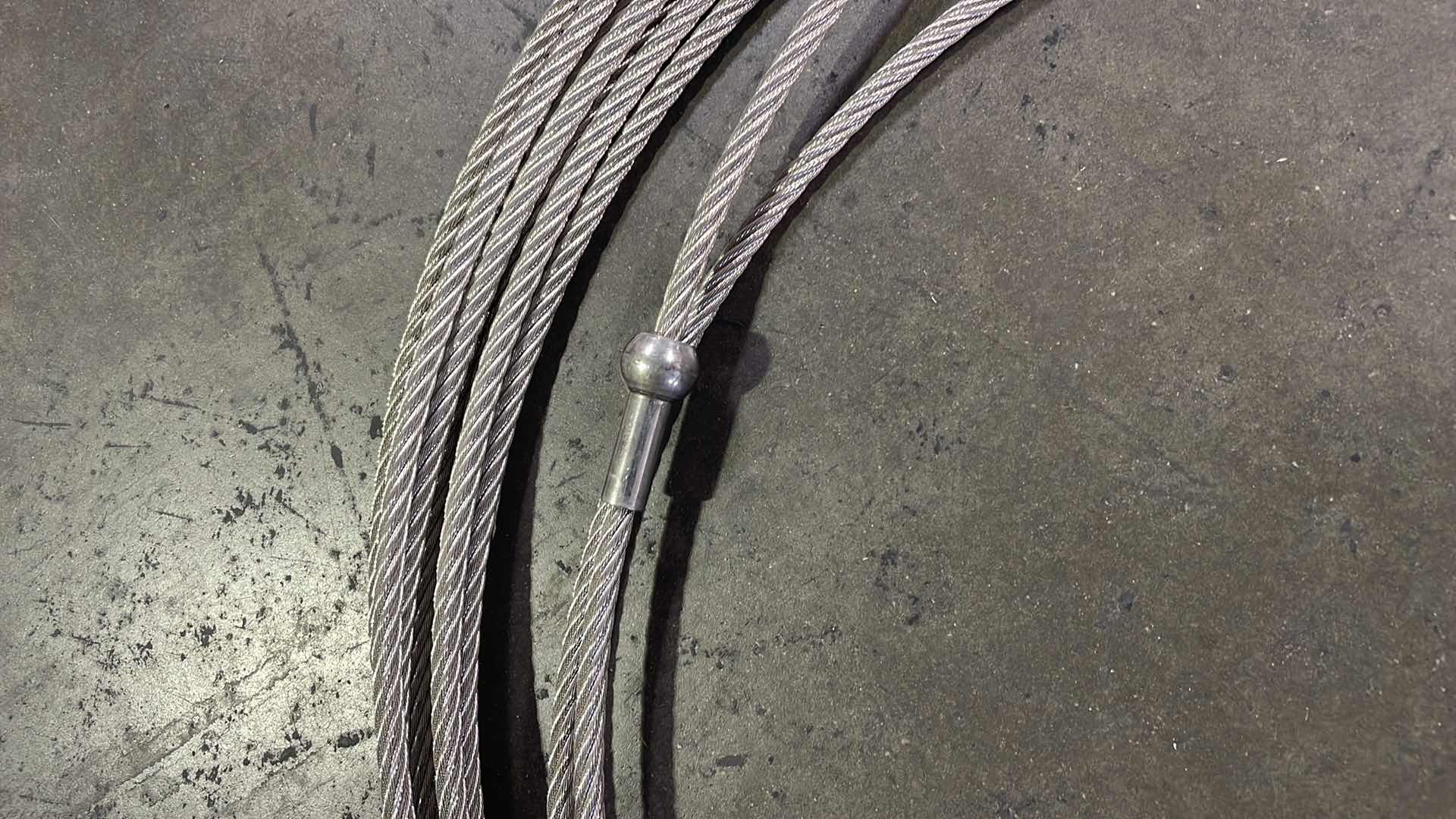 Photo 1 of 5/16” WIRE ROPE WITH HOOK RATED TO 5000LBS UNKNOWN LENGTH