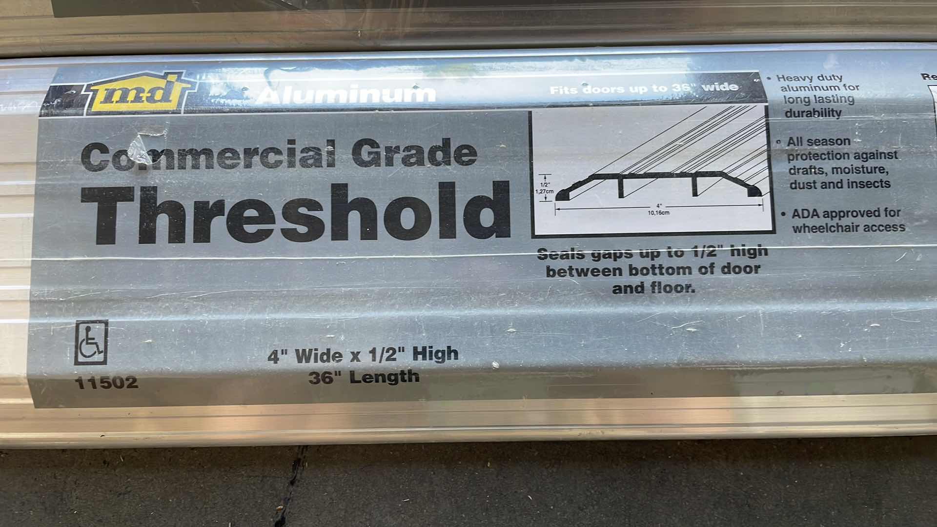 Photo 1 of M-D 11502 36" ALUMINUM HEAVY DUTY COMMERCIAL FLUTED TOP THRESHOLD (5)