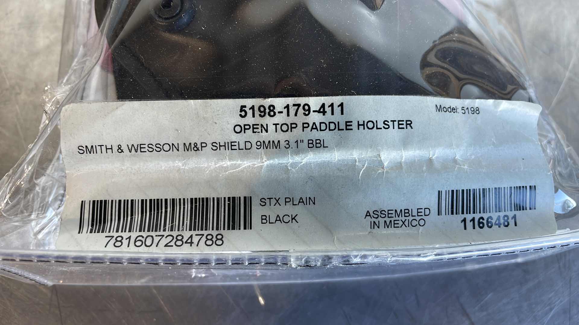 Photo 1 of SAFARILAND SMITH & WESSON M&P SHIELD 9MM 3.1" BBL MODEL: 5198 OPEN TOP PADDLE HOLSTER