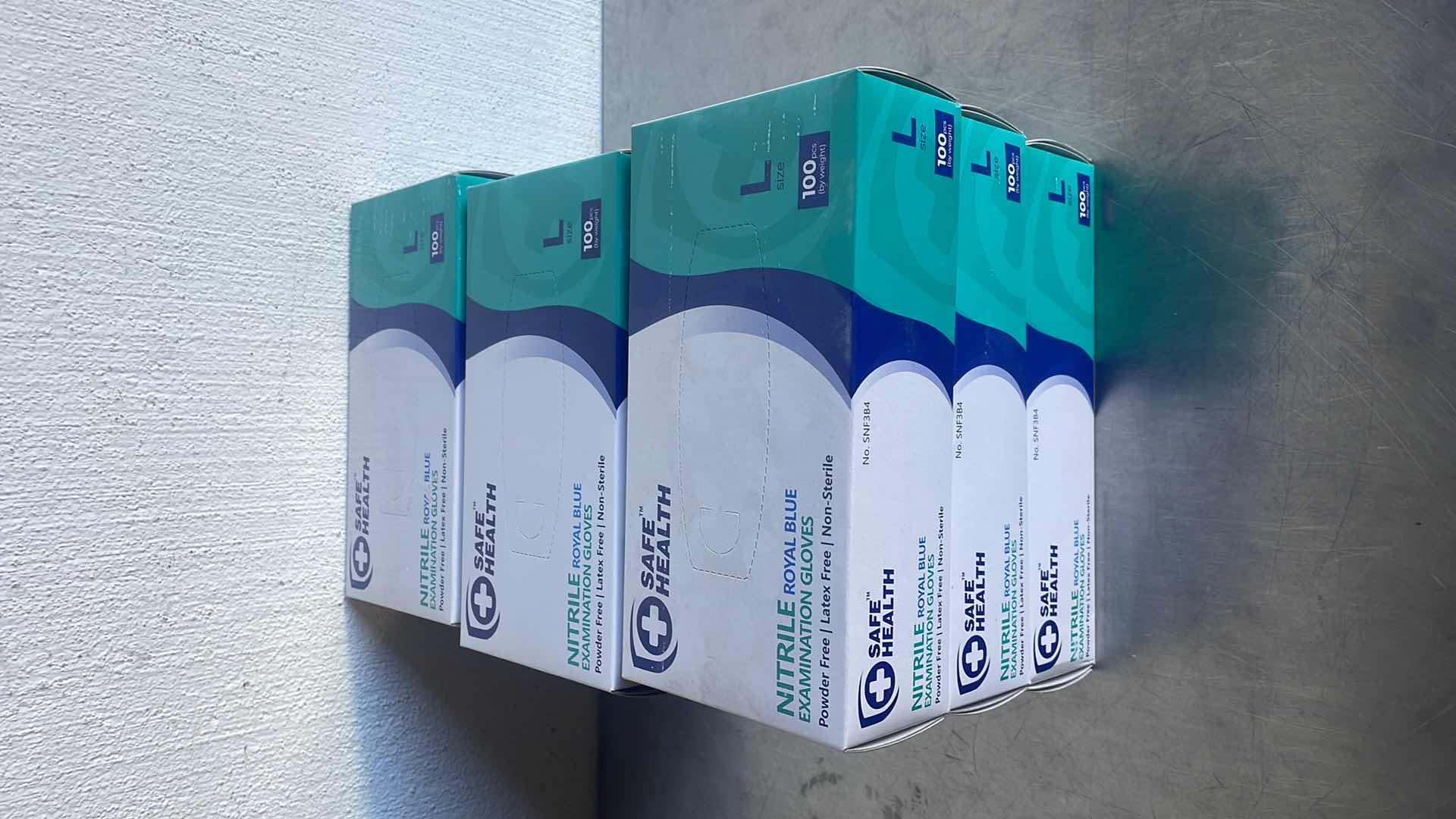 Photo 1 of SAFE HEALTH NITRILE EXAM DISPOSABLE GLOVES, LARGE, LATEX FREE, POWDER FREE, BLUE, TEXTURED, 3.5 MIL, MEDICAL GRADE, FOOD, TATTOO, NURSING, CLEANING, SCHOOL 9 BOXES