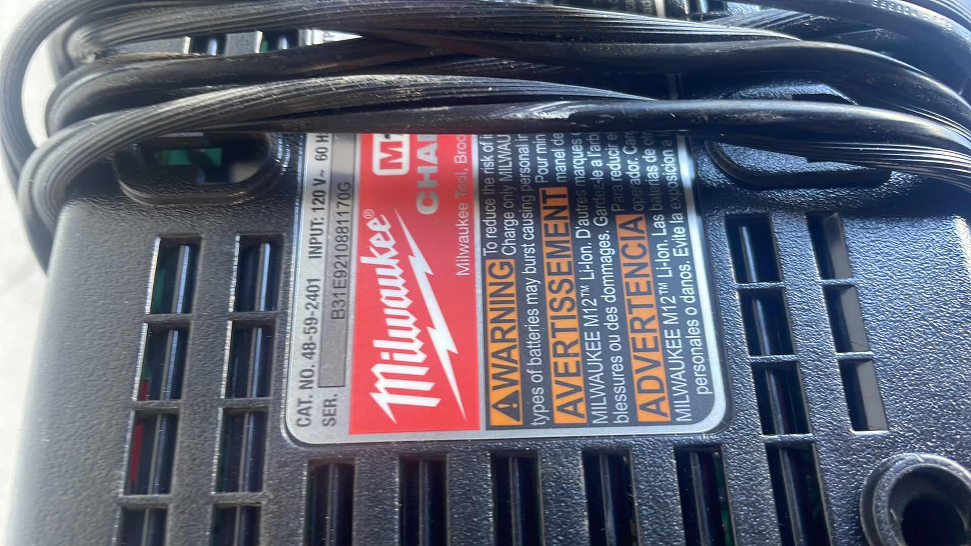 Photo 1 of MILWAUKEE M12 BATTERY CHARGER