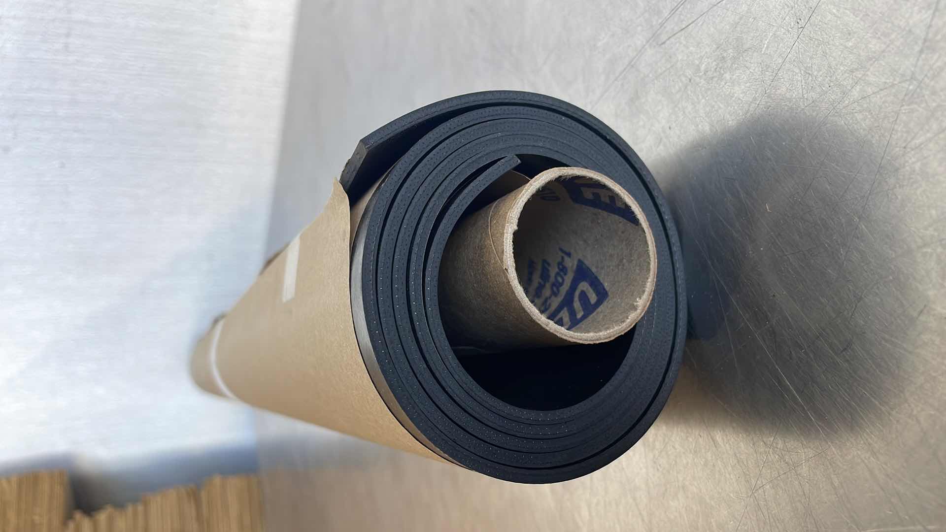 Photo 1 of 1/8” THICK RUBBER MAT 36-1/2” UNKNOWN LENGTH