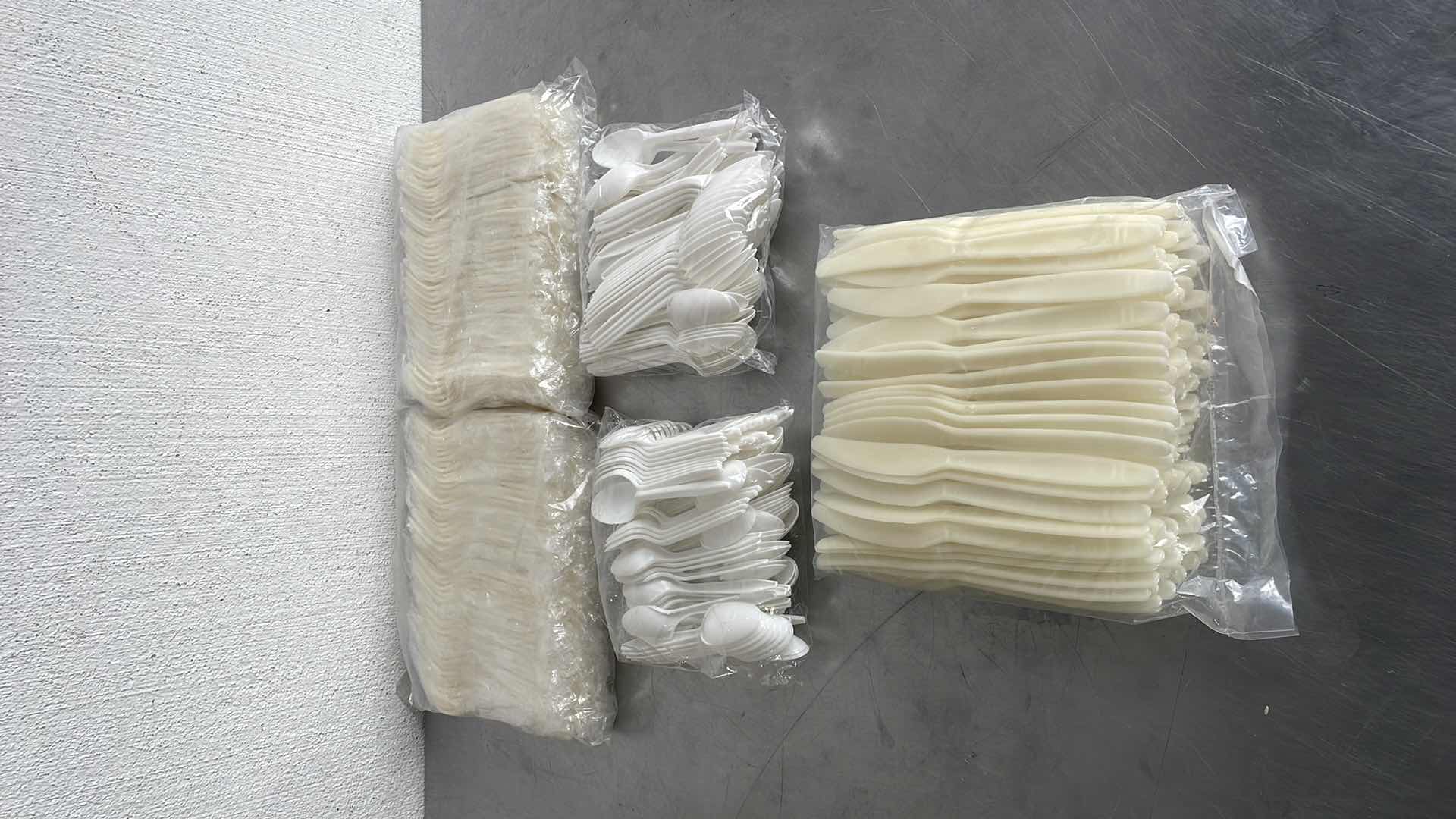 Photo 1 of PLASTIC FORKS SPOONS KNIFES