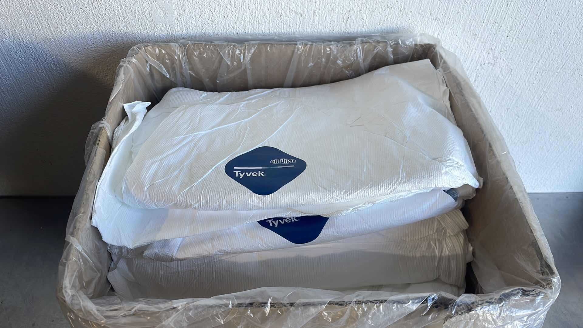 Photo 1 of TYVEK DUPONT PERSONAL PROTECTIVE COVERALLS SIZE XL APPROX 20PCS
