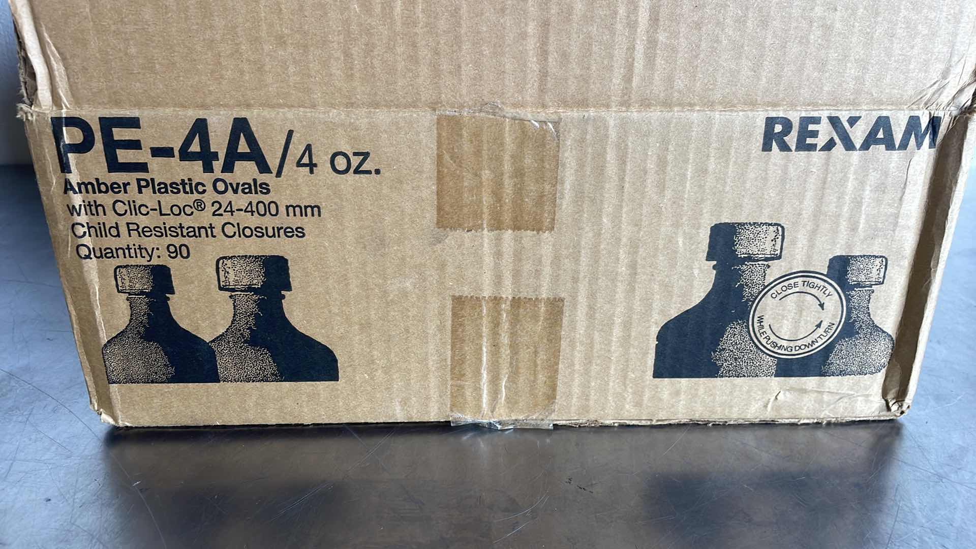 Photo 1 of AMBER PLASTIC BOTTLES 4 OZ WITH SAFETY CAPS 90CT