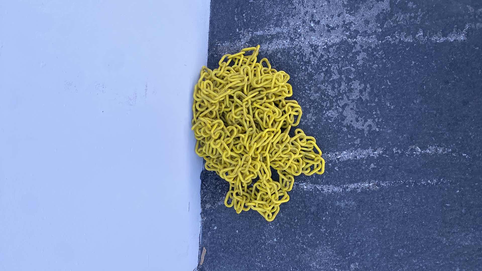 Photo 1 of APROXIMALLY 50’ YELLOW PLASTIC CHAIN