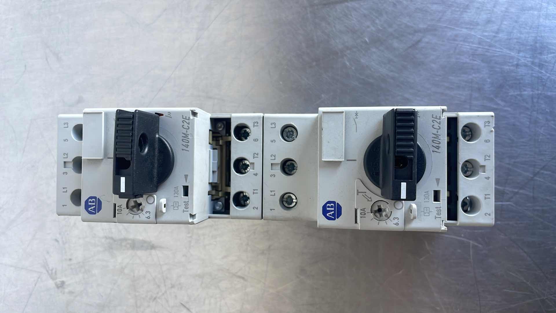 Photo 1 of ALLEN-BRADLEY MP CIRCUIT BREAKER (MPCB), STD MAGNETIC TRIP, 6.3-10A
PART #: 140M-C2E-C10 (2)