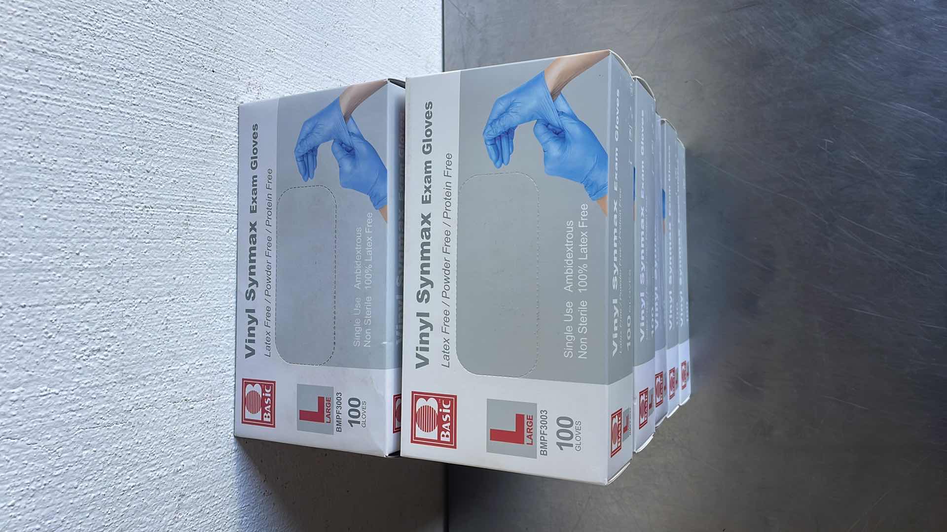 Photo 1 of BASIC LARGE VINYL SYNMAXEXAM GLOVES 10 BOXES OF 100