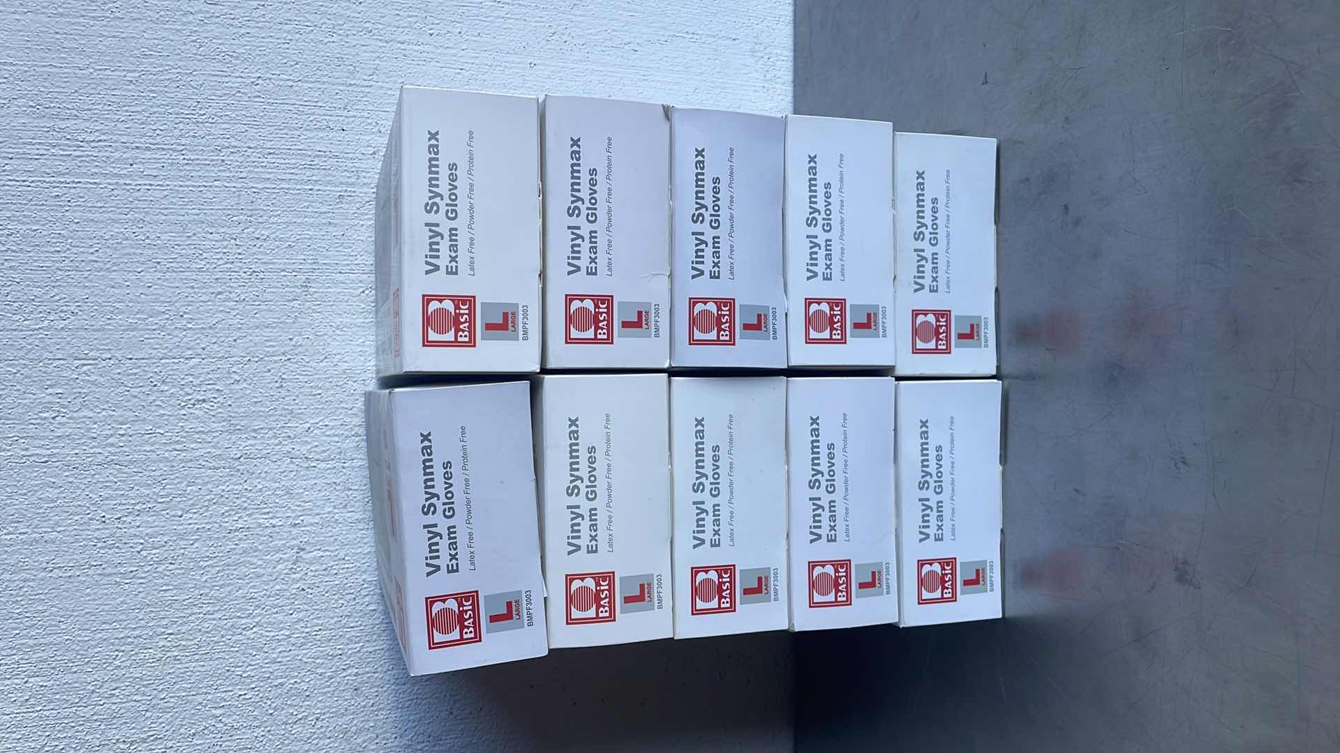 Photo 1 of BASIC LARGE VINYL SYNMAXEXAM GLOVES 10 BOXES OF 100