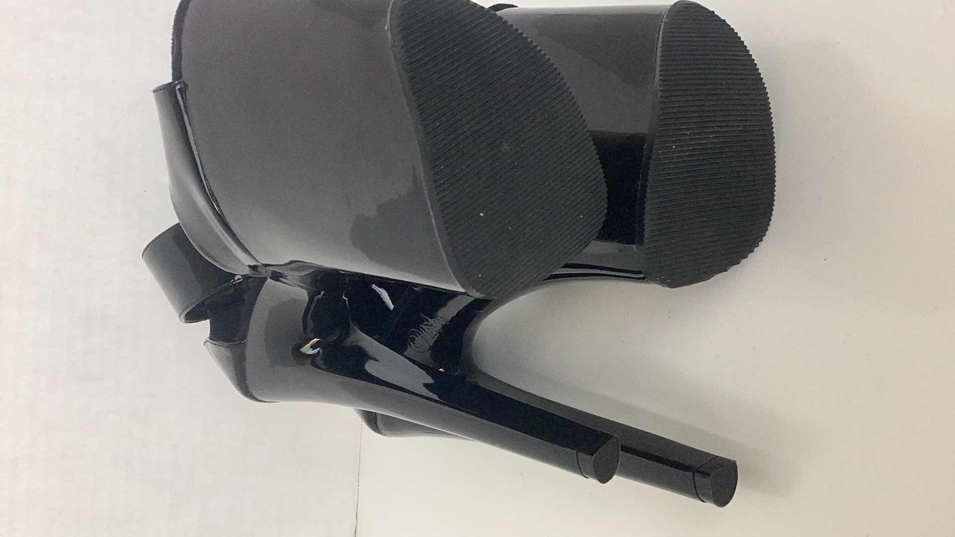 Photo 1 of PLEASER EXTREME 875 4 1/4" FRONT PLATFORM 8” HEEL SIZE 8.5