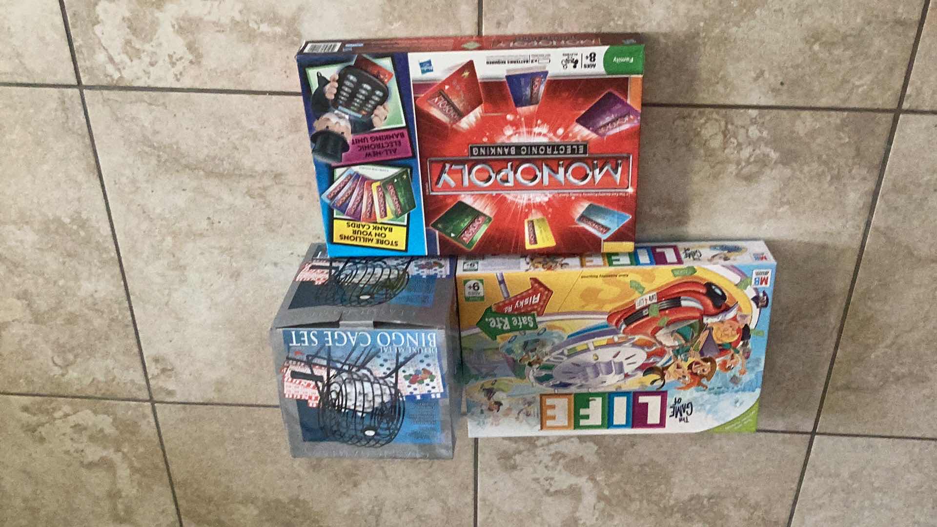 Photo 1 of LIFE, BINGO, AND ELECTRONIC MONOPOLY GAMES