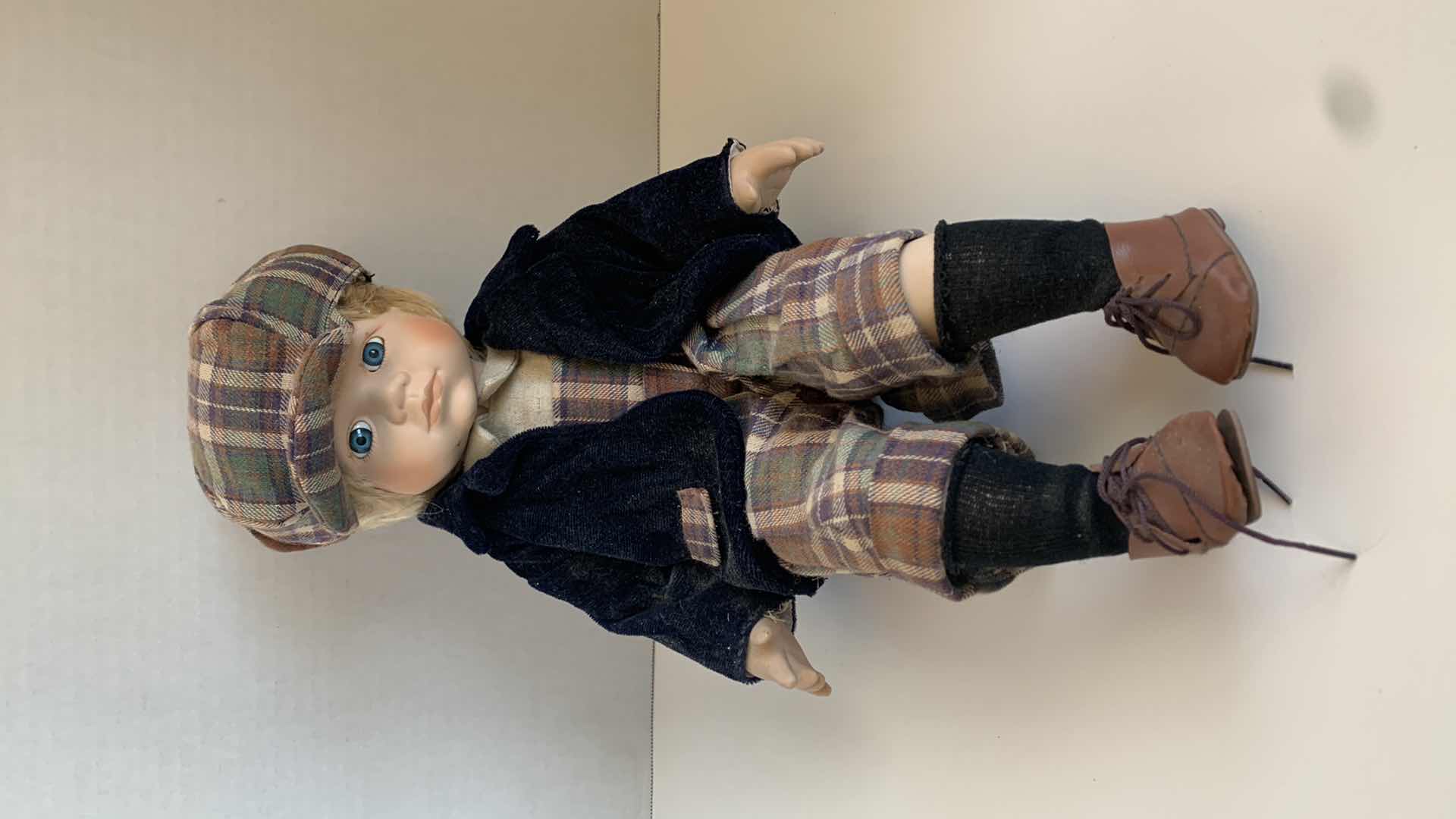 Photo 1 of SET OF 2 CERAMIC DOLLS ON BENCH