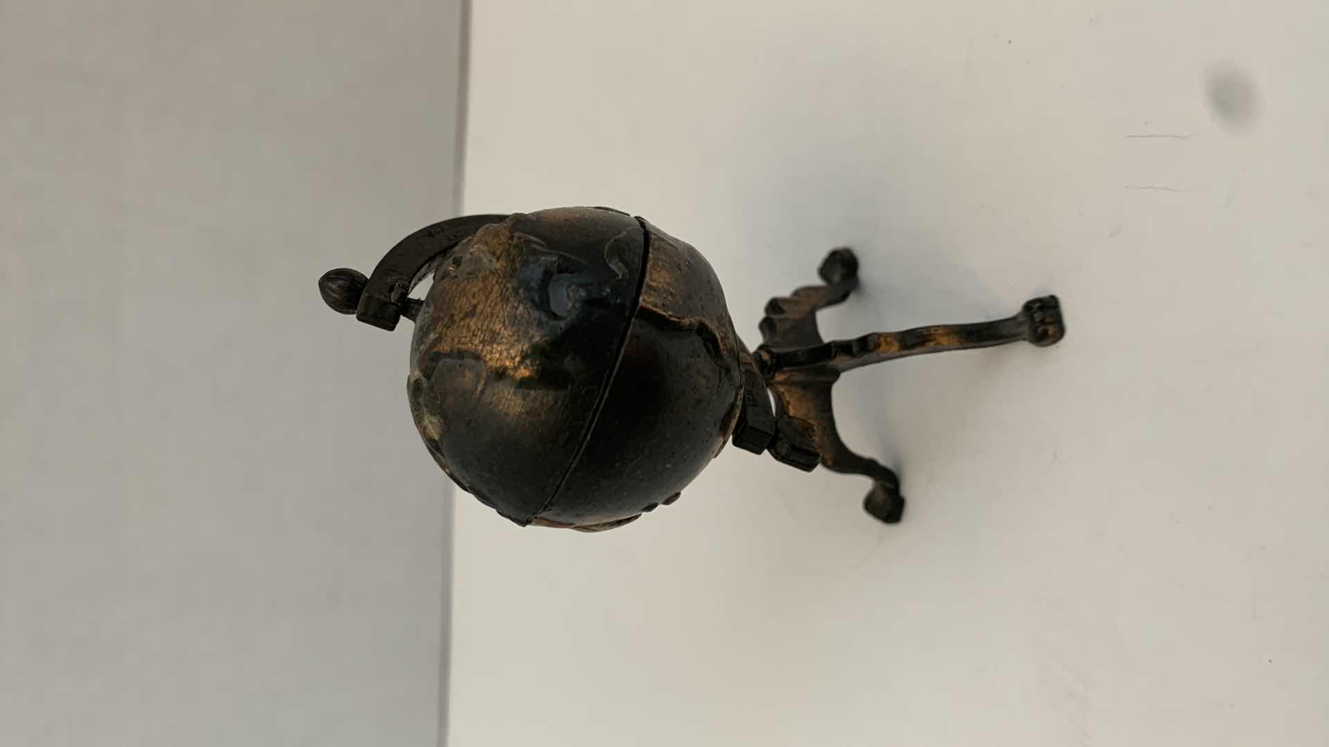 Photo 1 of SET OF 2 METAL STATUES: GLOBE AND TYPEWRITER WITH WOODEN CLOCK TALLEST 3"