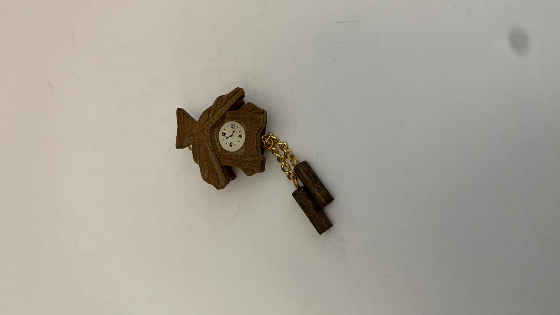 Photo 1 of SET OF 2 METAL STATUES: GLOBE AND TYPEWRITER WITH WOODEN CLOCK TALLEST 3"