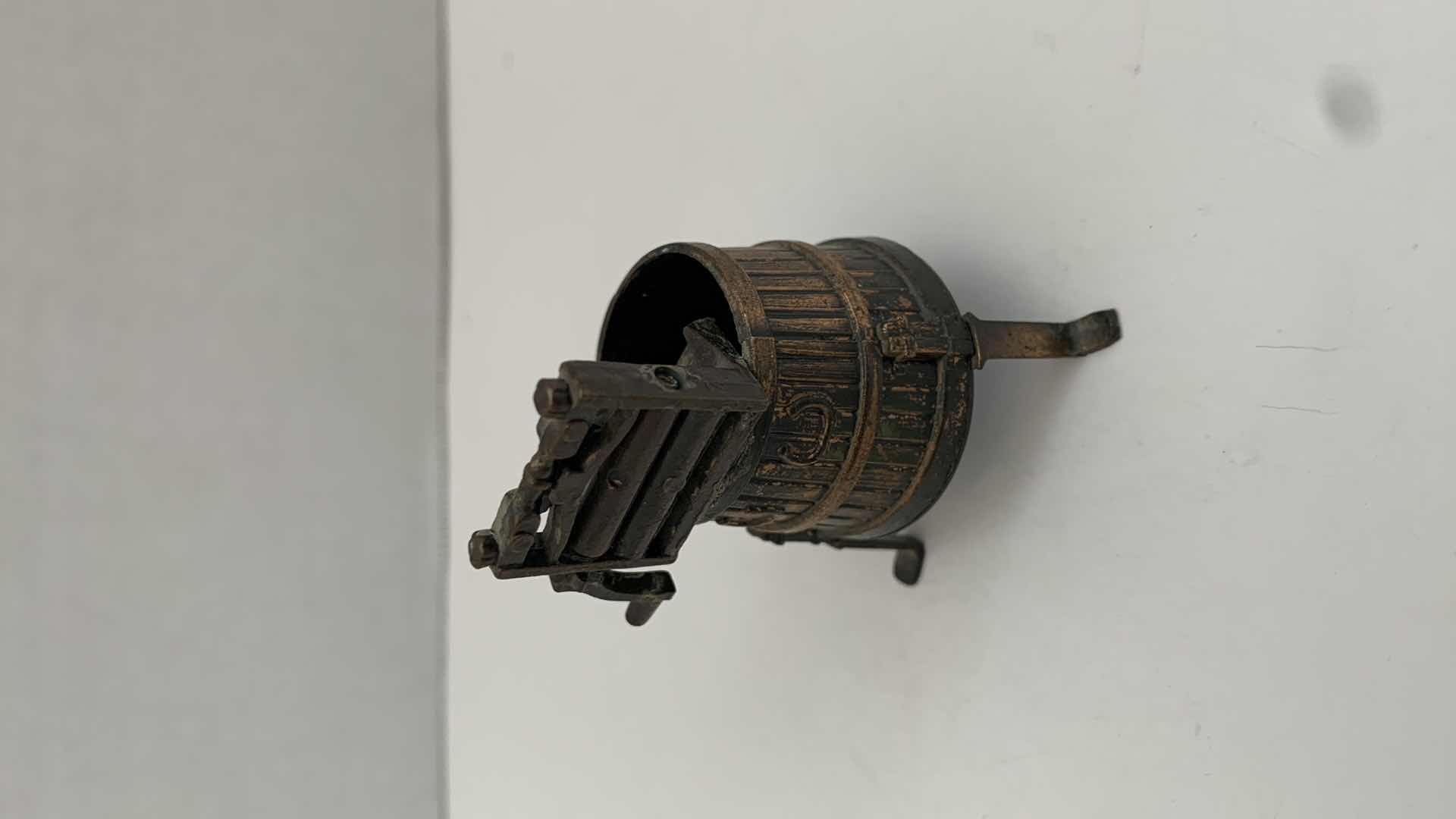 Photo 1 of SET OF 2 METAL STATUES: SPINNING WHEEL PENCIL SHARPENER AND CLOTHING MANGLE TALLEST 4"