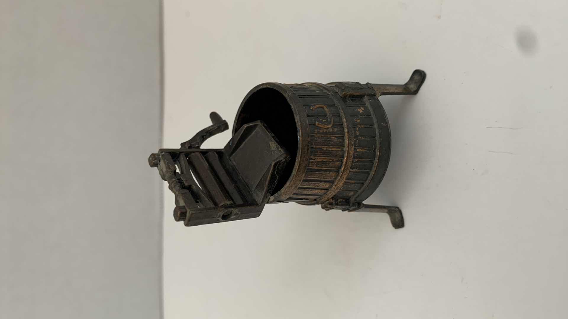 Photo 1 of SET OF 2 METAL STATUES: SPINNING WHEEL PENCIL SHARPENER AND CLOTHING MANGLE TALLEST 4"