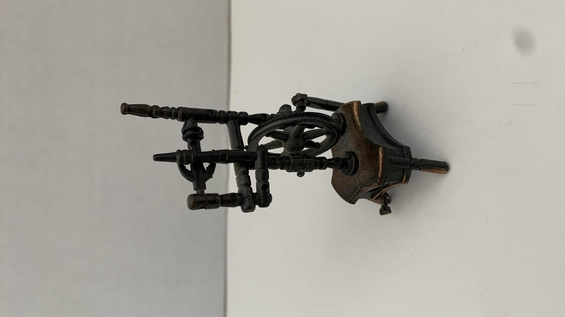 Photo 1 of SET OF 2 METAL STATUES: SPINNING WHEEL PENCIL SHARPENER AND CLOTHING MANGLE TALLEST 4"