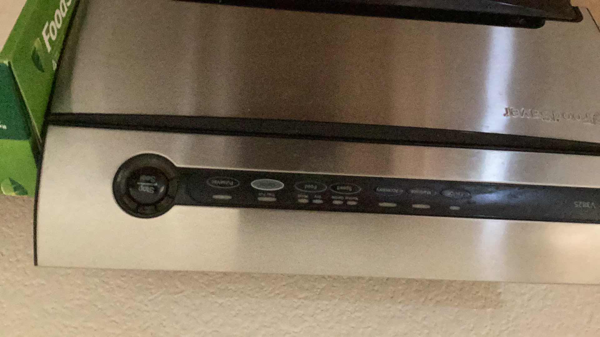 Photo 1 of FOOD SAVER WITH EXTRA ROLLS