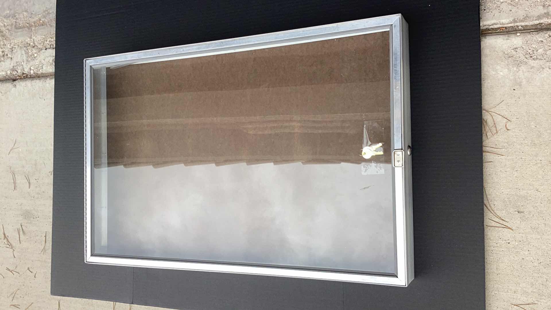 Photo 1 of ALUMINIUM DISPLAY CASE WITH KEY 34” X 22” H 3”