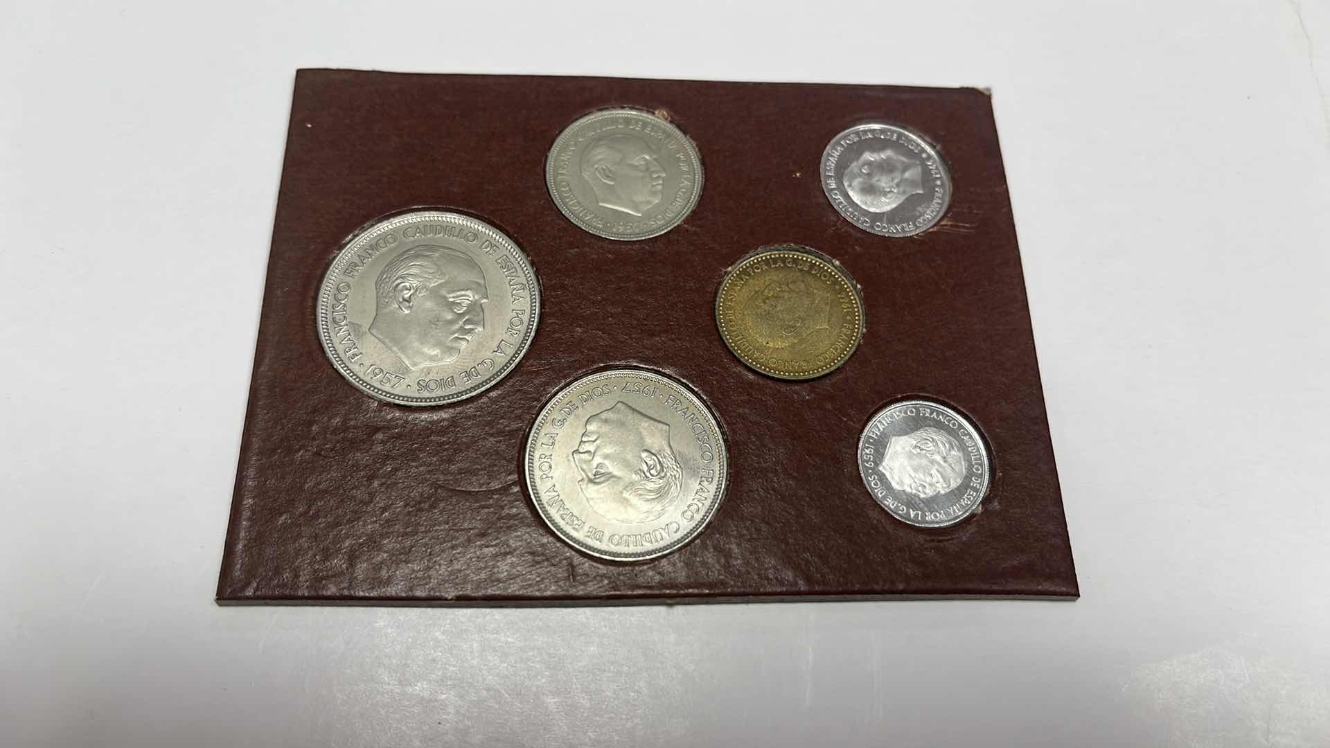 Photo 1 of NATIONAL MINT AND STAMP FACTORY VINYL SPANISH 1957 COIN SET OF 6