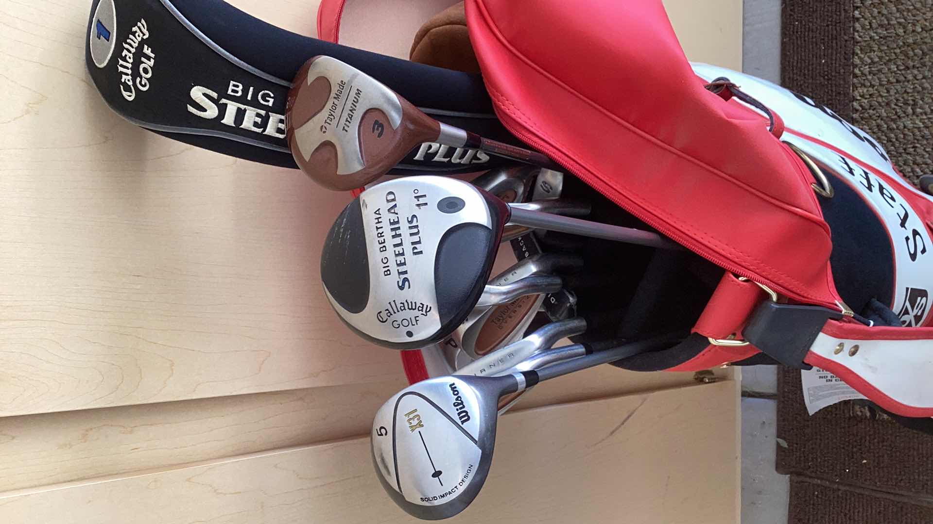 Photo 2 of CALLAWAY BIG BERTHA STEELHEAD PLUS DRIVER, TAYLOR MADE 3 WOOD, TALYOR MADE OVER SIZE BURNER IRONS, WILSON STAFF BAG