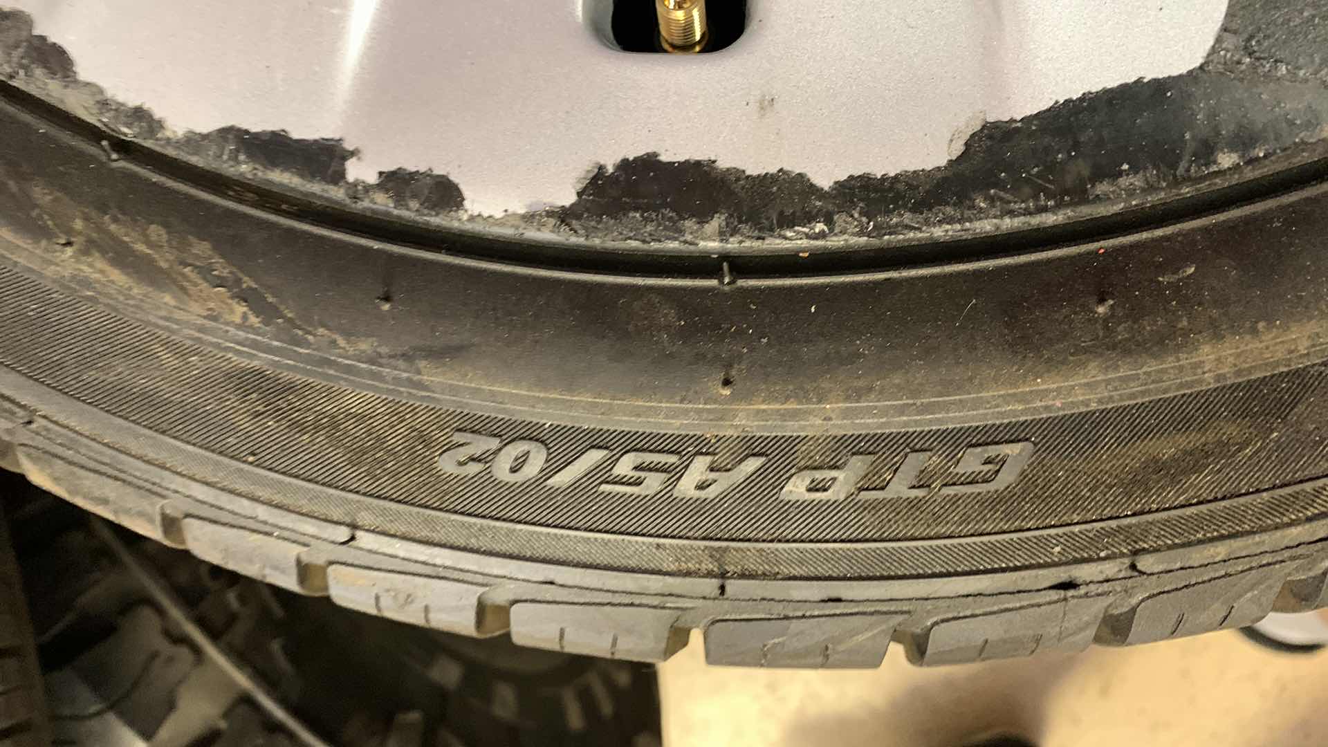 Photo 1 of 4 TELSA STOCK RIMS WITH PROCONTACT RC ROAD HUGGER GTP A5/02 TIRES AND SPARE TIRE 235/40 R 19 96V