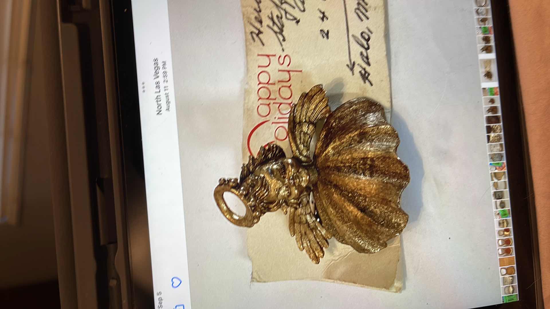 View 1 of ANTIQUE HEROLDS STAFFS ANGEL BOY BROOCH
