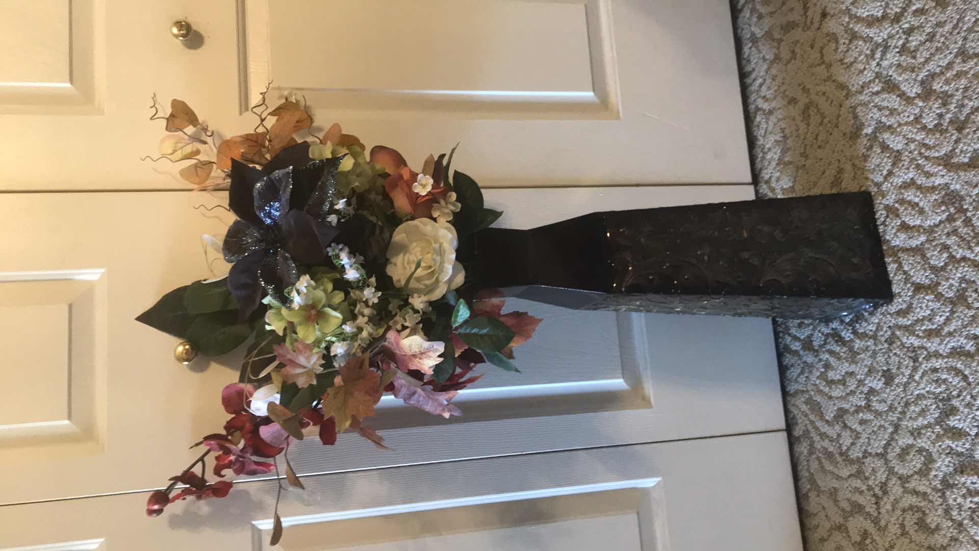 Photo 1 of FLORAL ARRANGEMENT IN MTAL EMBOSSED VASE H- 38”