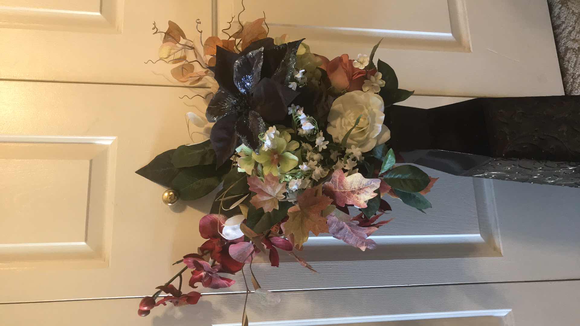 Photo 1 of FLORAL ARRANGEMENT IN MTAL EMBOSSED VASE H- 38”