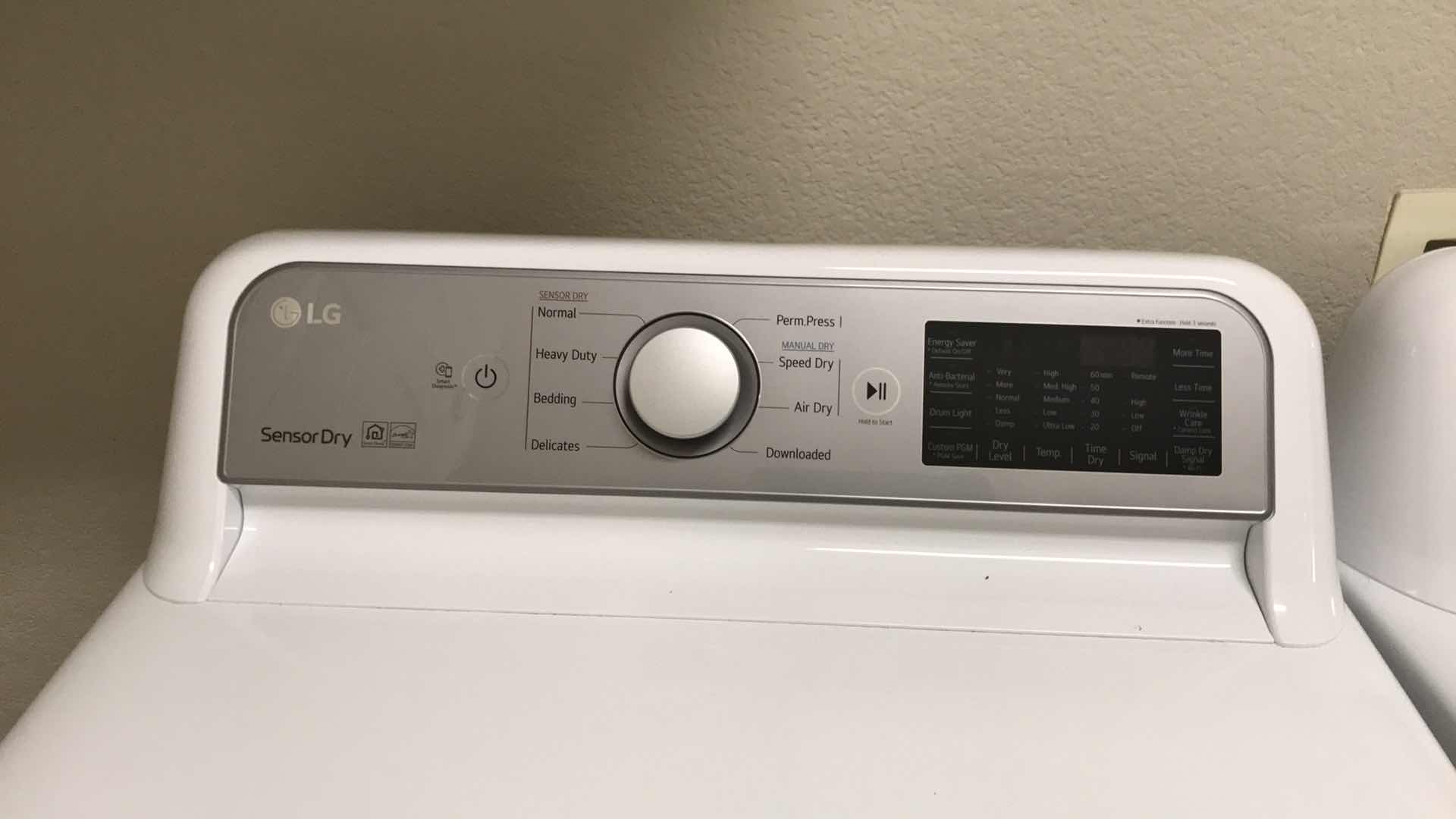 Photo 1 of LG 7.3 CU. FT. ULTRA LARGE CAPACITY SMART WI-FI ENABLED ELECTRIC DRYER WITH SENSOR DRY TECHNOLOGY