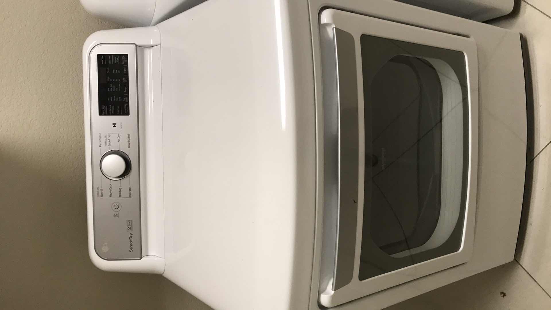 Photo 1 of LG 7.3 CU. FT. ULTRA LARGE CAPACITY SMART WI-FI ENABLED ELECTRIC DRYER WITH SENSOR DRY TECHNOLOGY