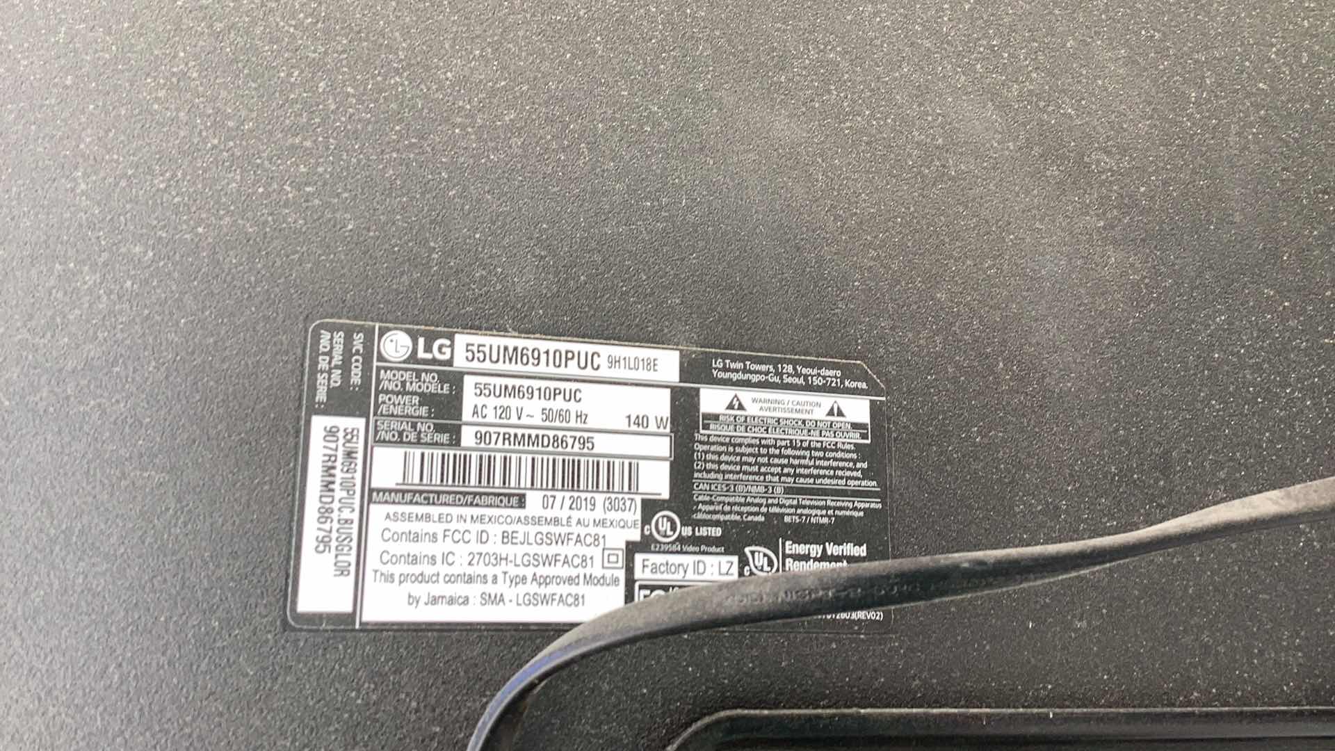 Photo 1 of LG 55" Class 4K UHD Smart LED TV W/ MOUNT 55UM6910PUC - BUYER TO REMOVE