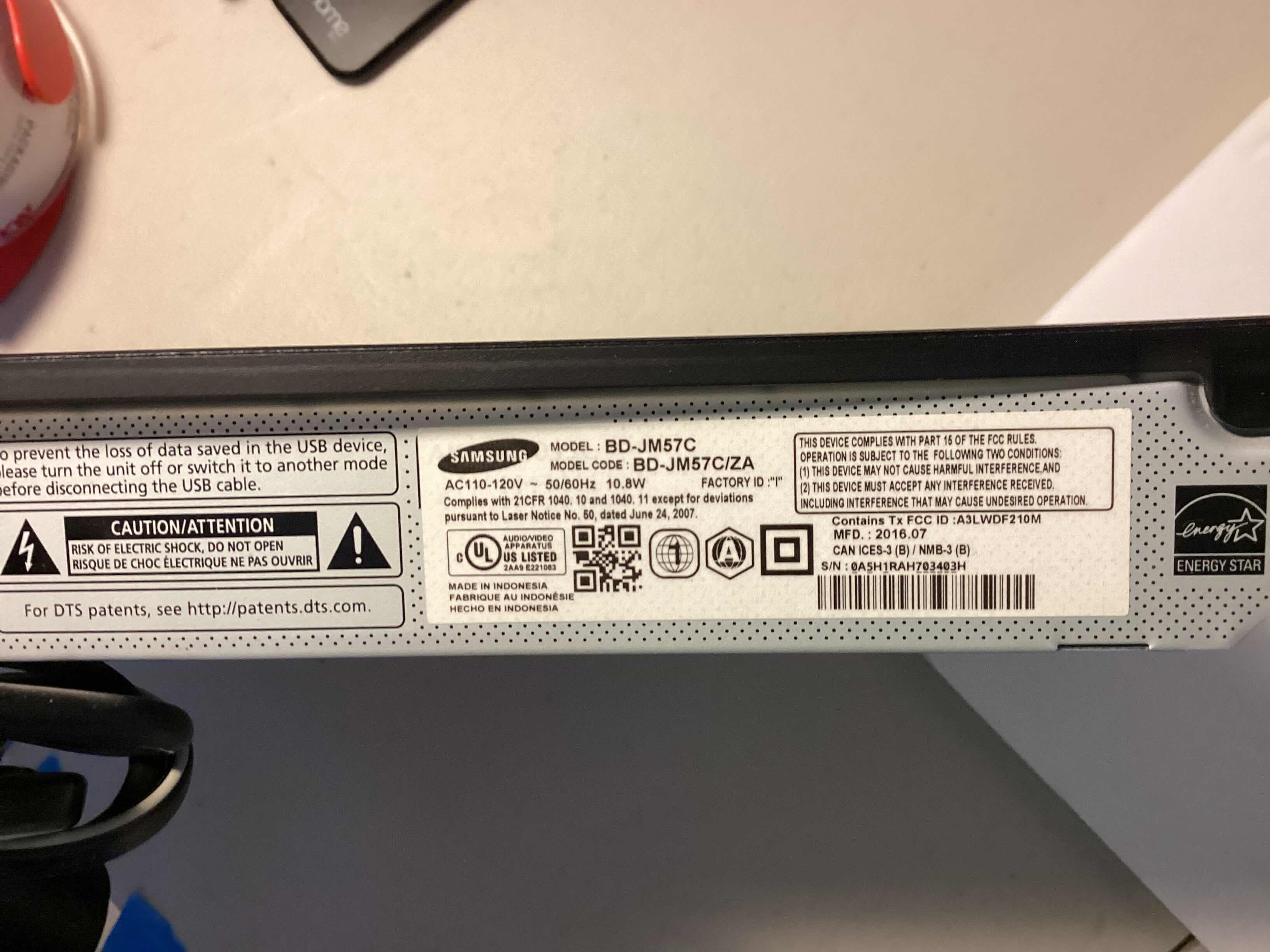 Photo 1 of SAMSUNG BLUE RAY PLAYER W/REMOTE MODEL BD-JM57C