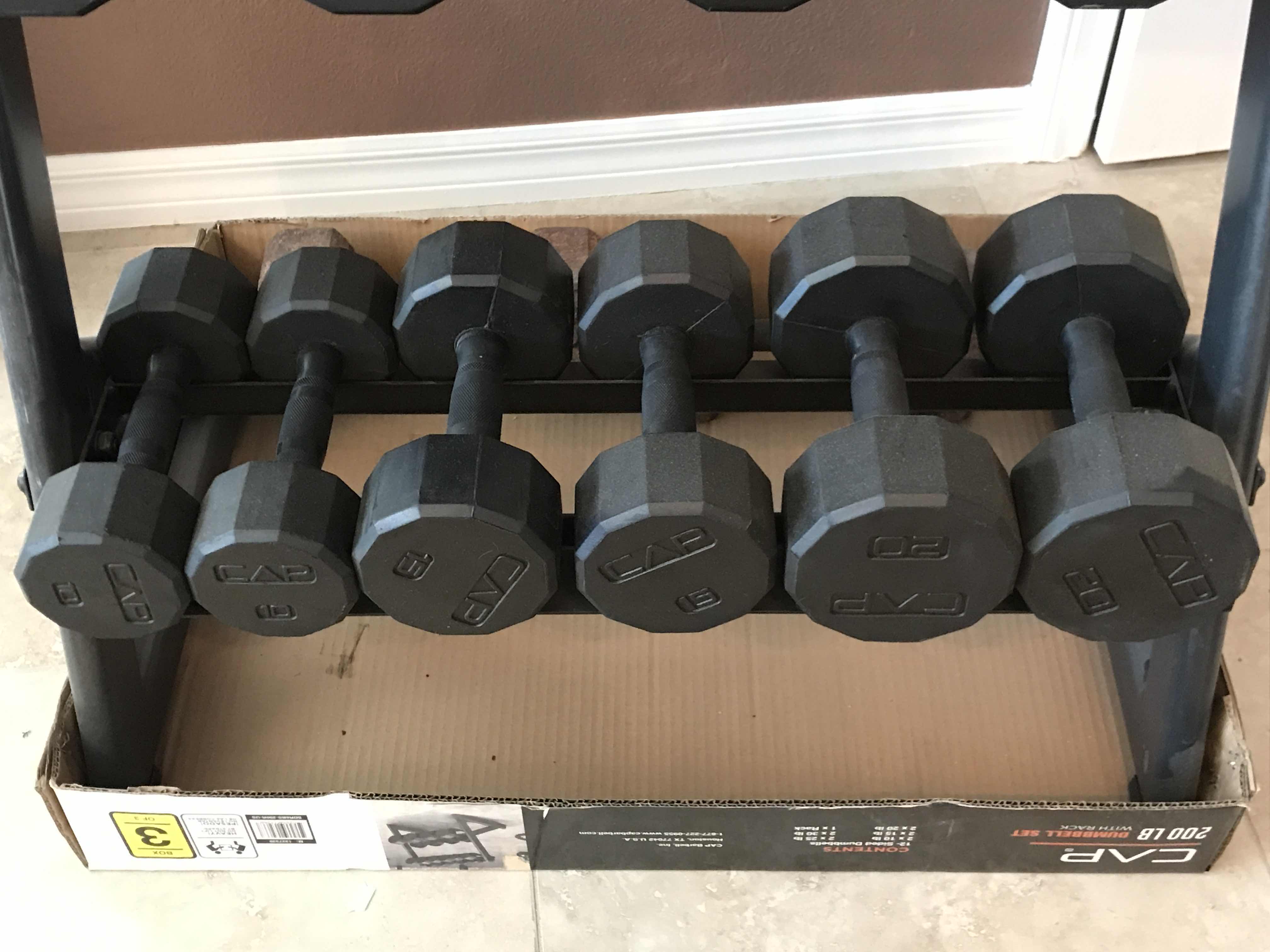 Photo 1 of CAP GYM EQUIPMENT 200LB DUMBELLS WITH STORAGE RACK