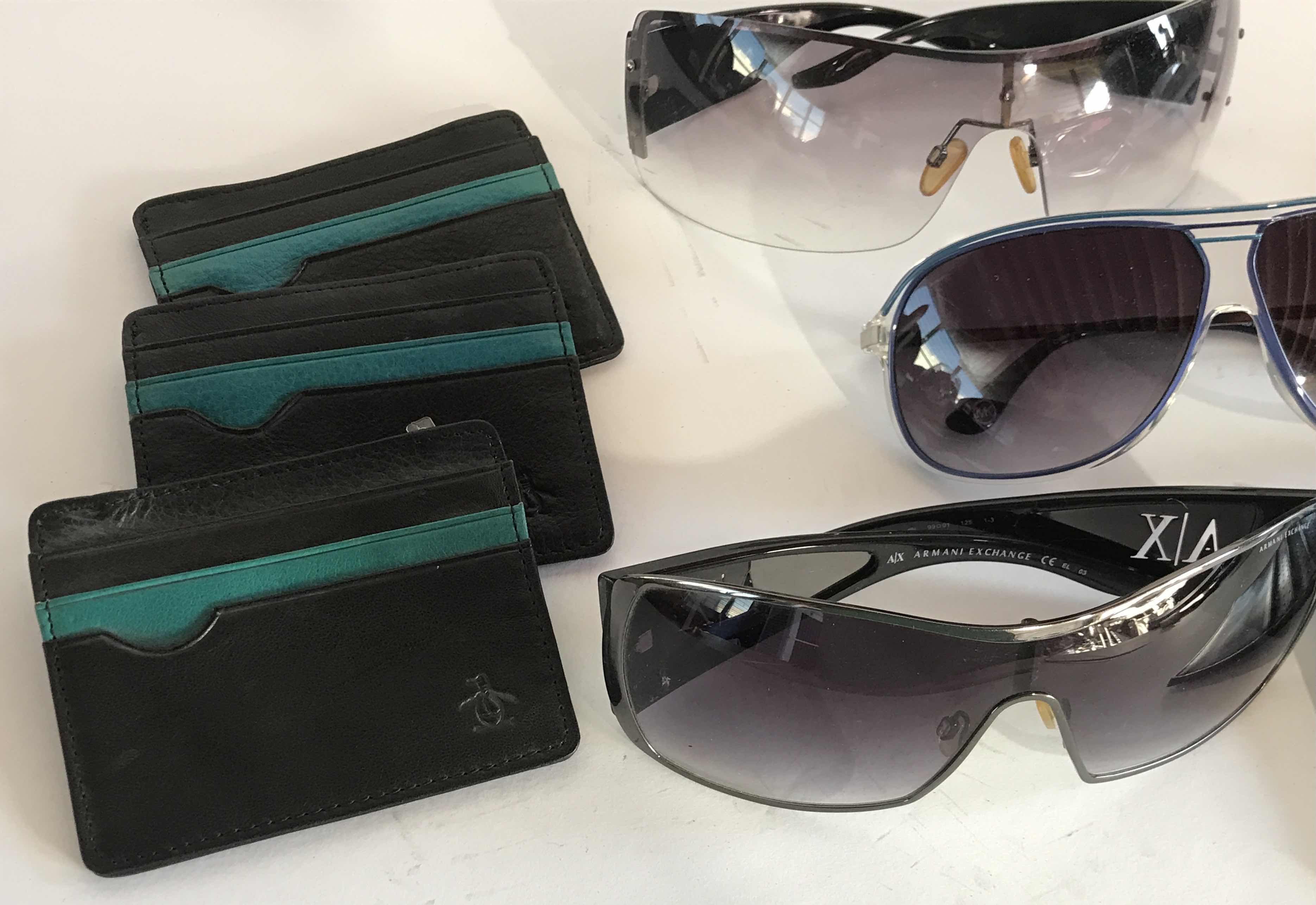 Photo 1 of COLLECTION OF WALETS AND SUNGLASSES UNAUTHENTICATED