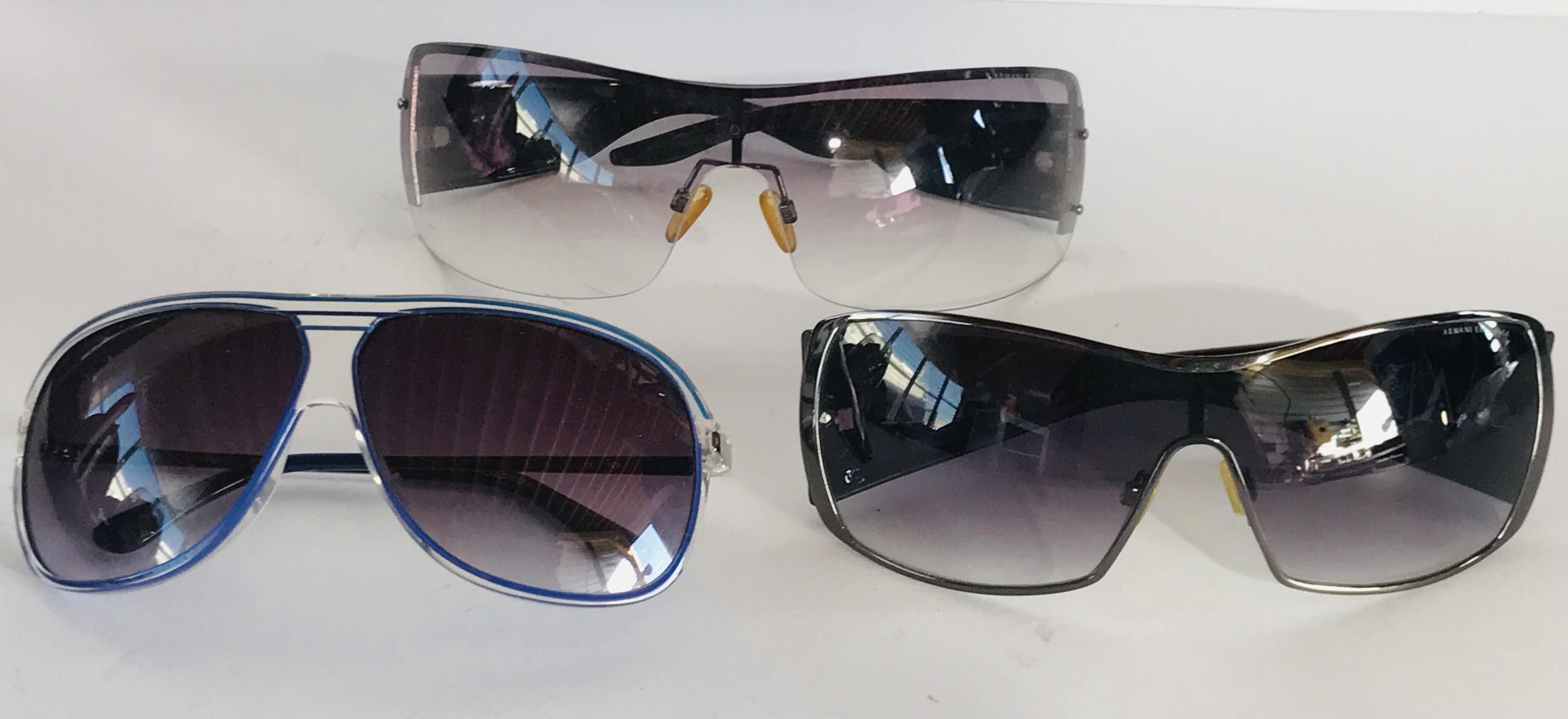 Photo 1 of COLLECTION OF WALETS AND SUNGLASSES UNAUTHENTICATED