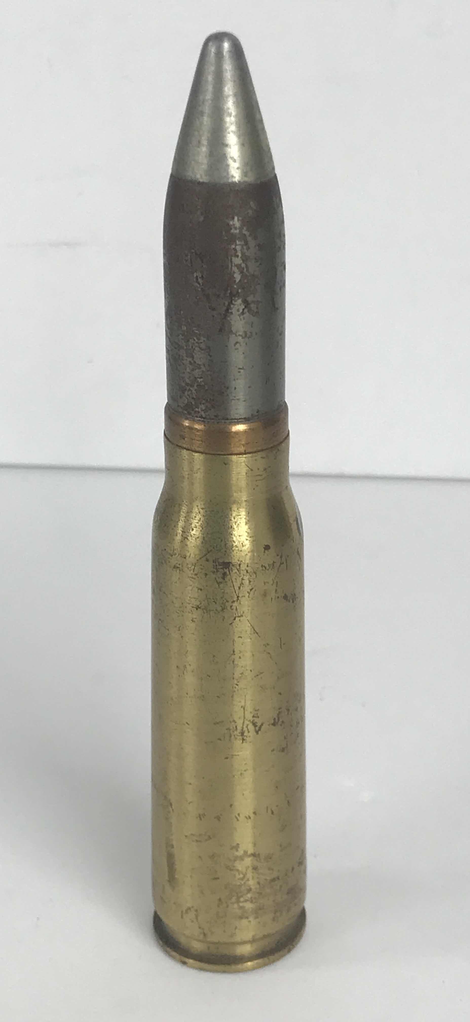 Photo 1 of 50 CALIBUR BULLET MADE INTO A BOTTLE OPENER