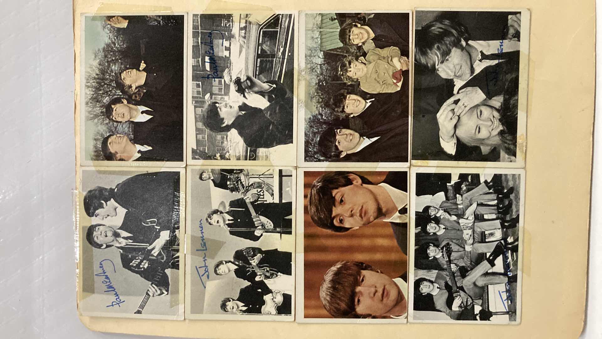 Photo 1 of BEATLES PHOTO COLLAGE AUTOGRAPHED BY BEATLES ATTACHED TO FOLDER